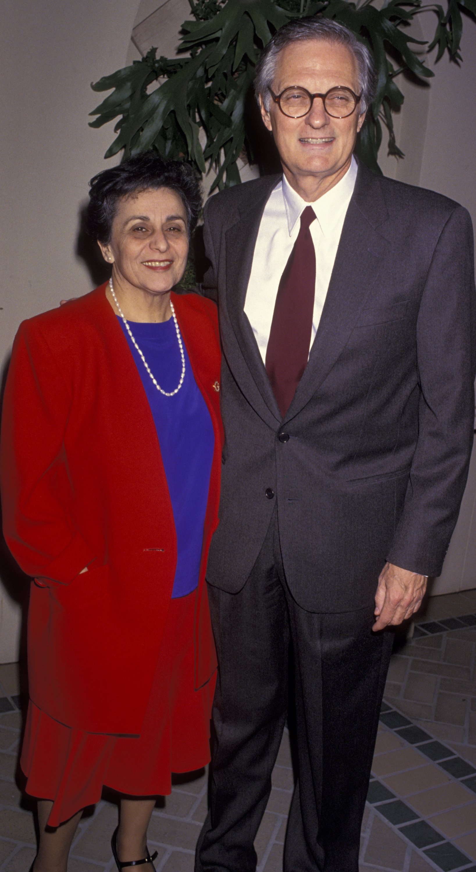 Alan Alda and Arlene Weiss attending the 11th Annual Museum of Television and Radio Cocktail Party at the Four Seasons Hotel on February 28, 1994 in Beverly Hills, California | Source: Getty Images