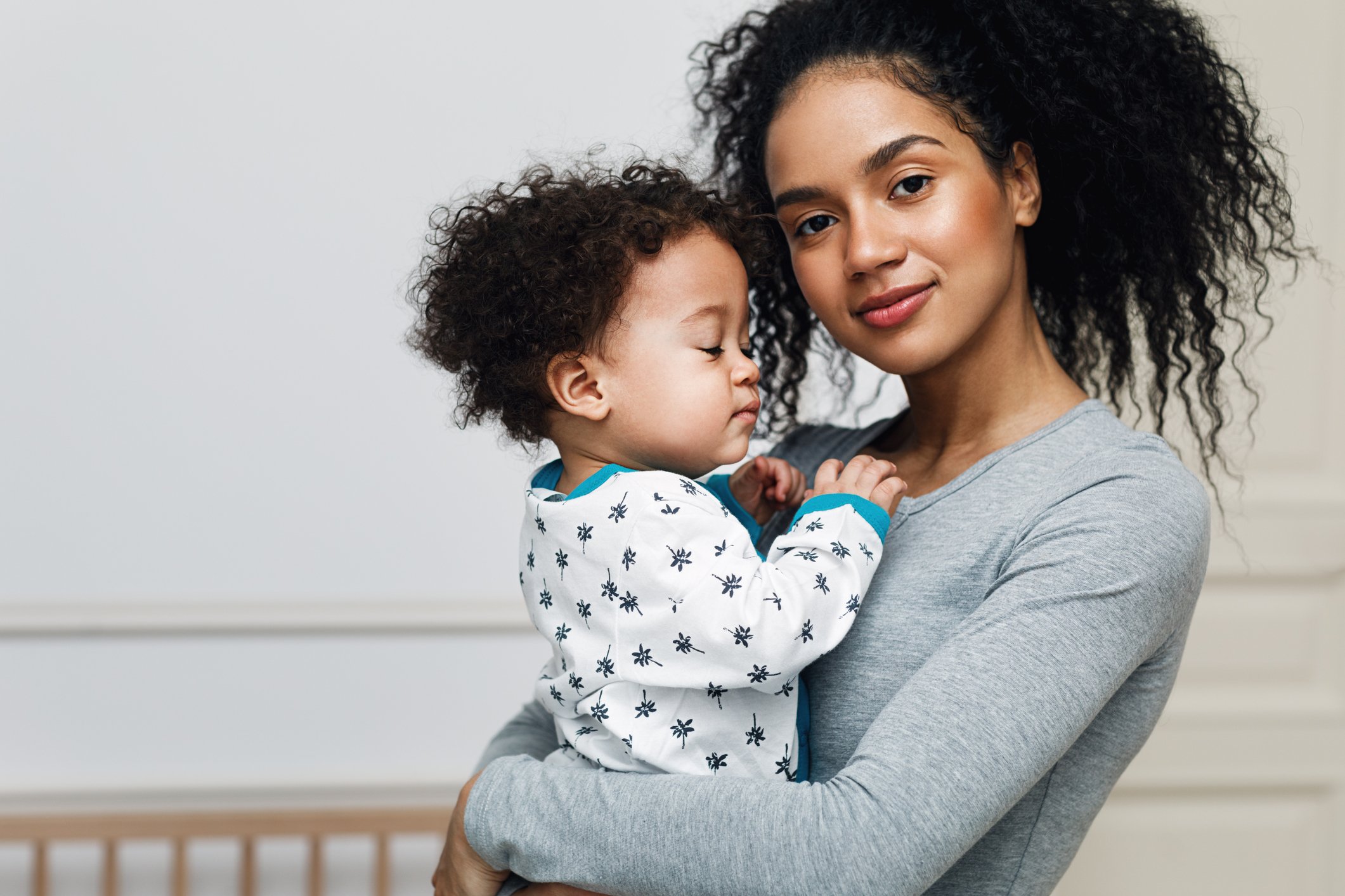 A woman holding her daughter | Source: Getty Images