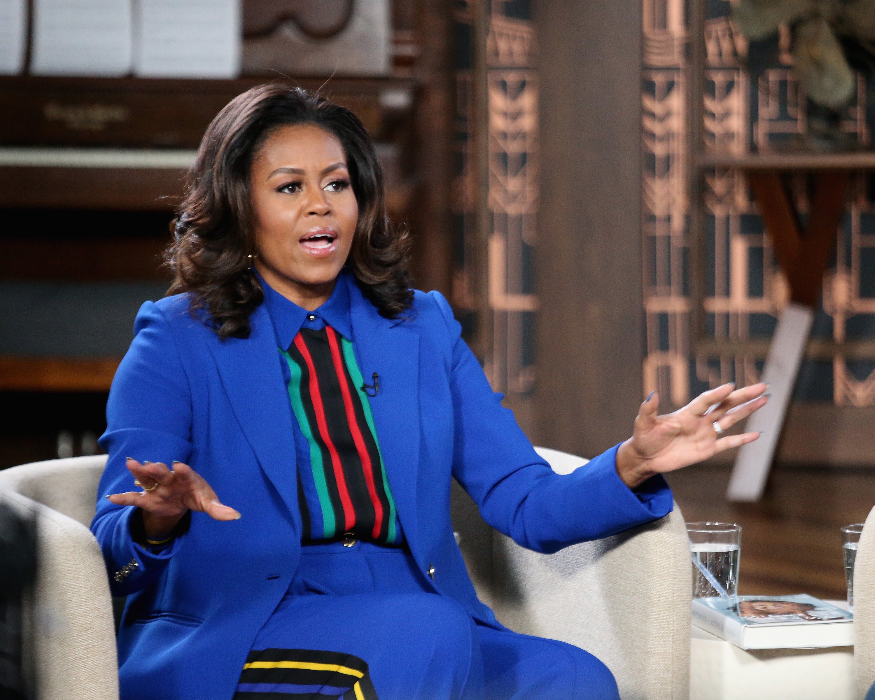Michelle Obama visits BookTube at Whitney M Young Magnet High school in March 2019 | Photo: Getty Images