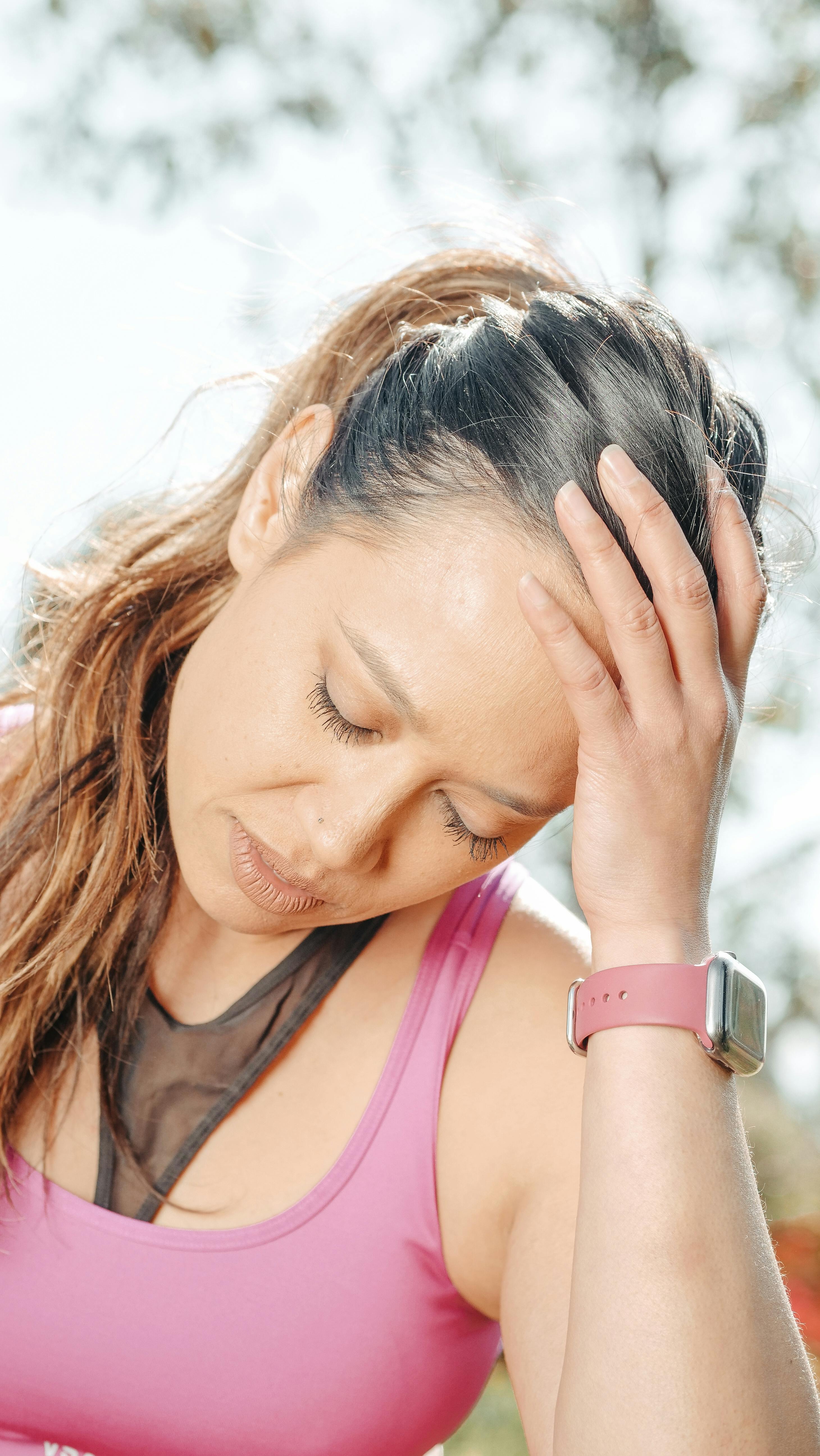 An exhausted runner resting after an intense workout. | Source: Pexels