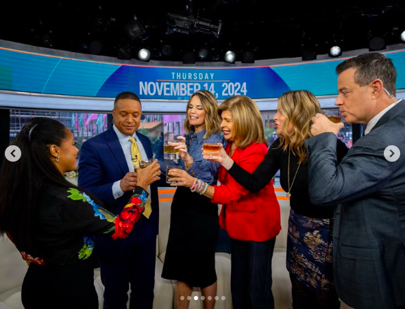 Sheinelle Jones toasting to Craig Melvin with Savannah Guthrie, Hoda Kotb, Jenna Bush Hager, and Carson Daly, posted on November 14, 2024. | Source: Instagram/sheinelle_o