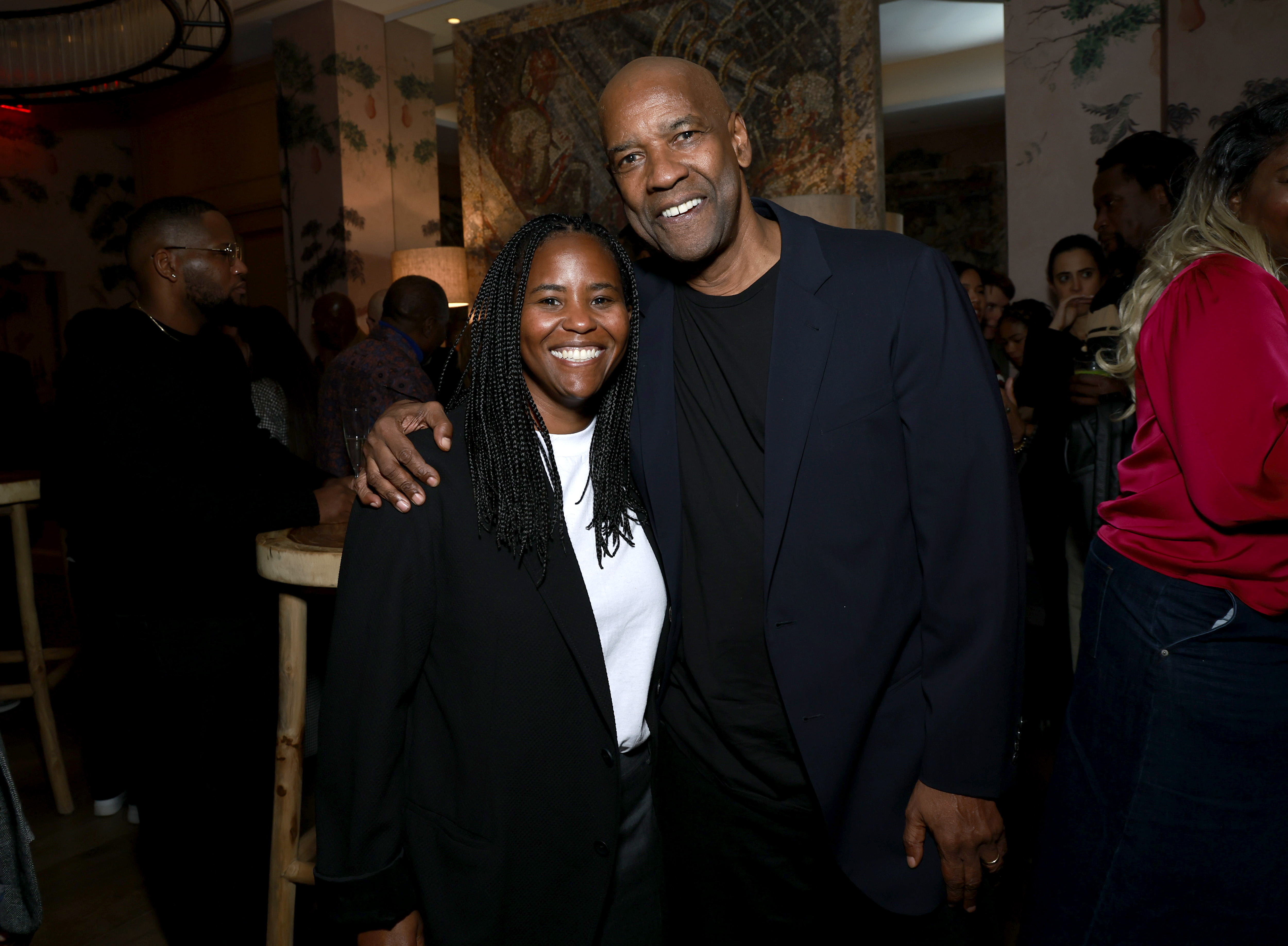 Katia and Denzel Washington attend "The Piano Lesson" New York Tastemaker screening on October 21, 2024, in New York City. | Source: Getty Images