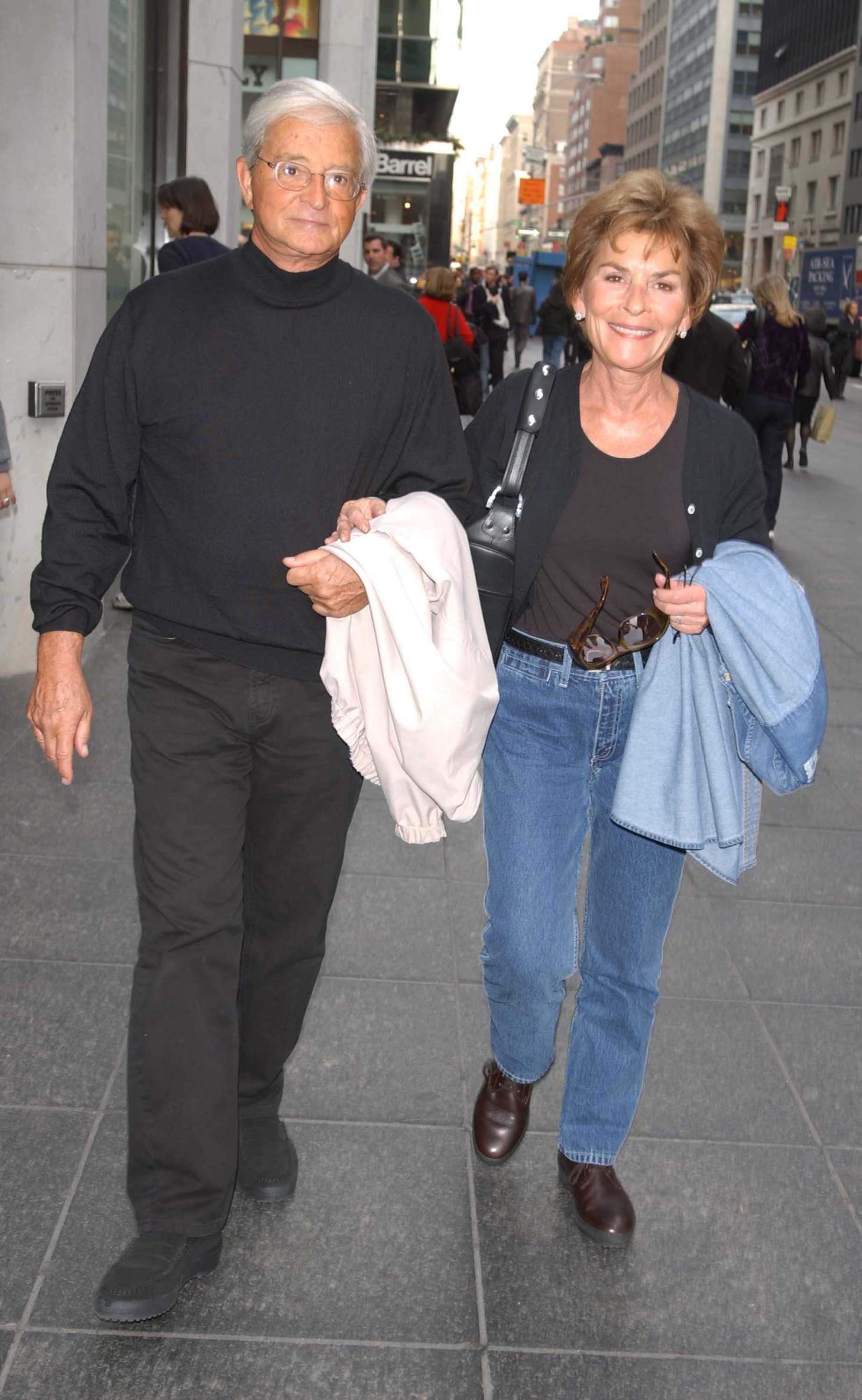Judges Jerry and Judy Sheindlin walk down Madison Ave on January 29, 2002, in New York City | Source: Getty Images