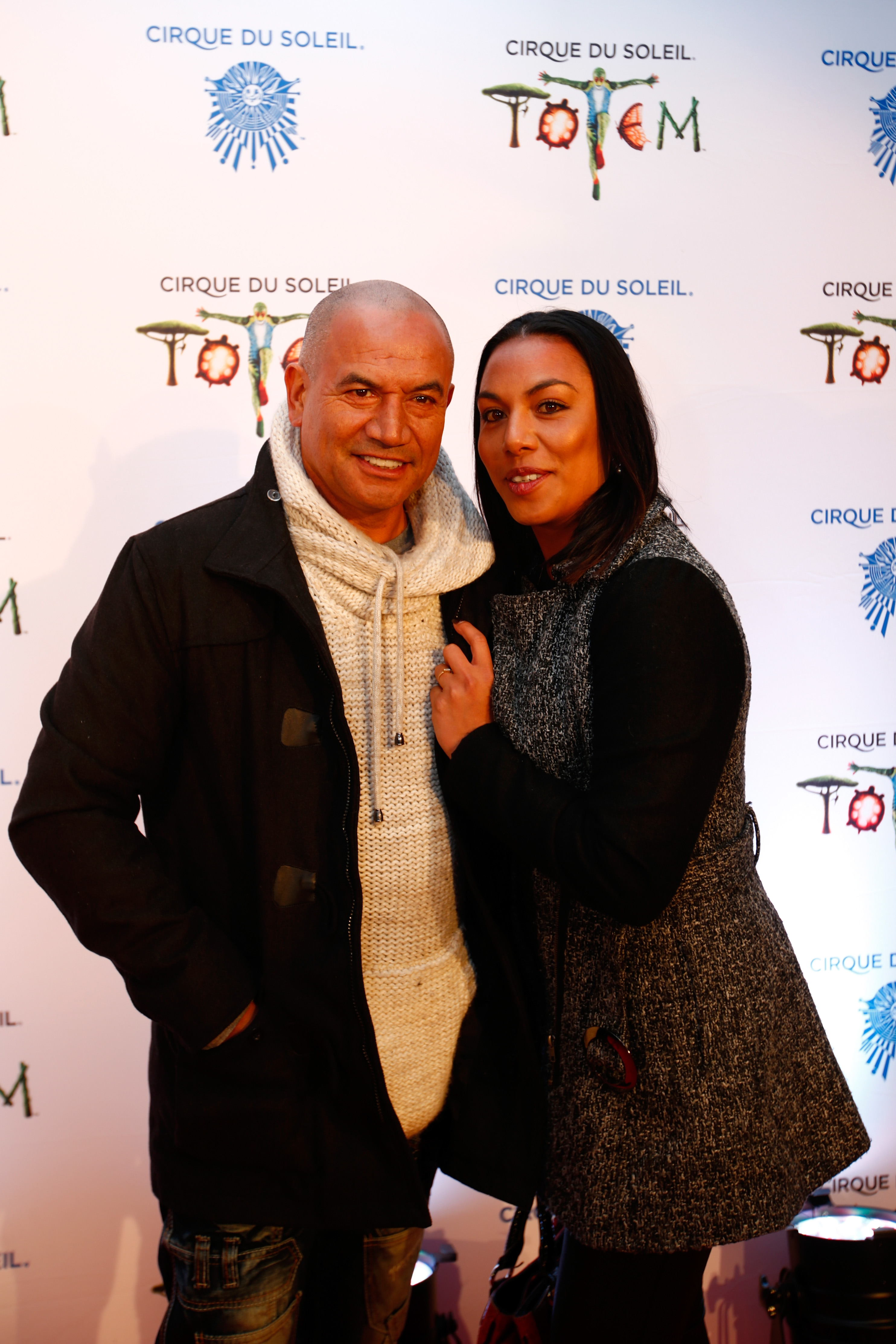 Temuera Morrison and Ashlee Howden-Sadlier at the opening night of TOTEM from Cirque Du Soleil on August 22, 2014, in Auckland | Source: Getty Images