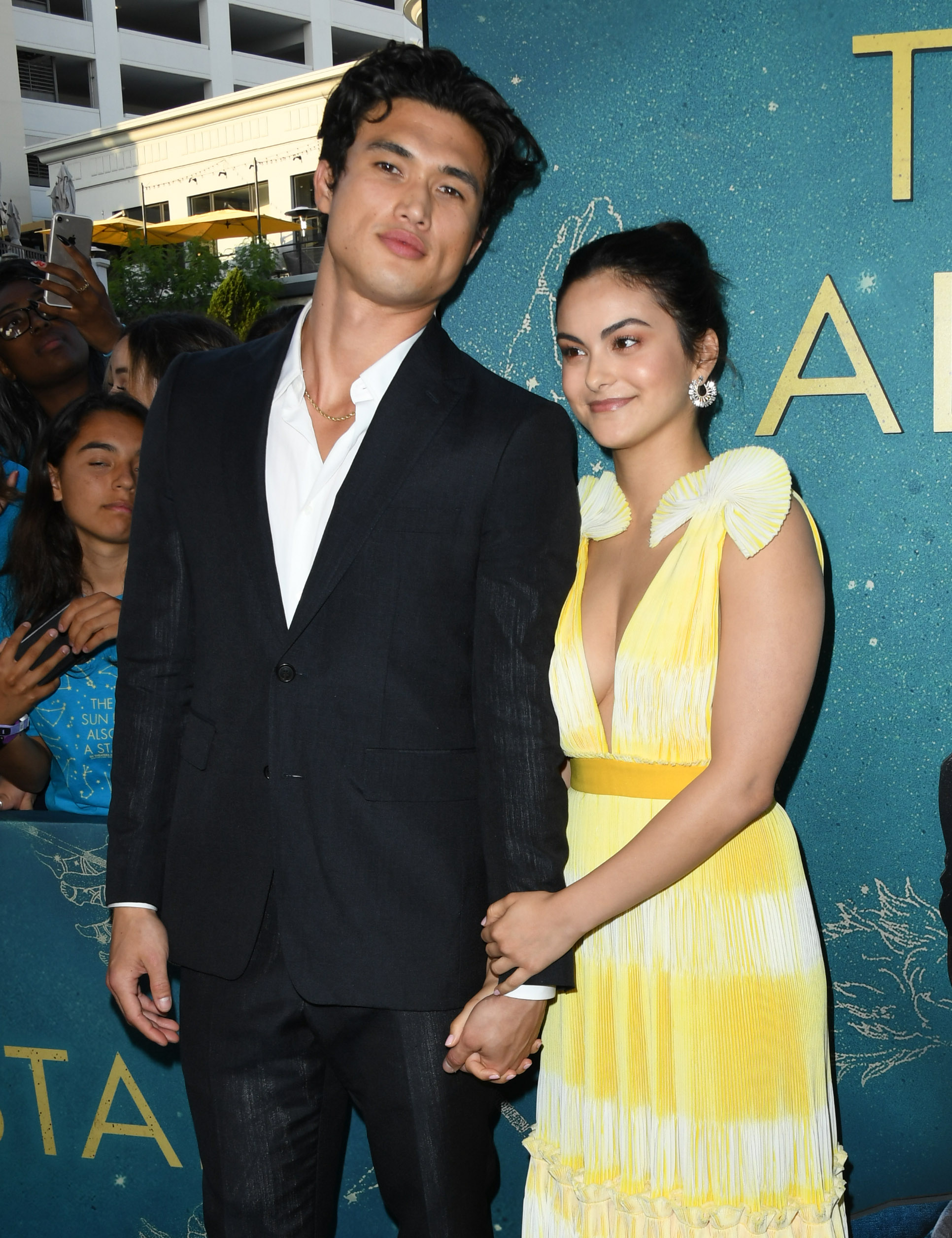 Charles Melton and Camila Mendes pose at the World Premiere Of Warner Bros "The Sun Is Also A Star" at Pacific Theaters at the Grove on May 13, 2019, in Los Angeles, California | Source: Getty Images