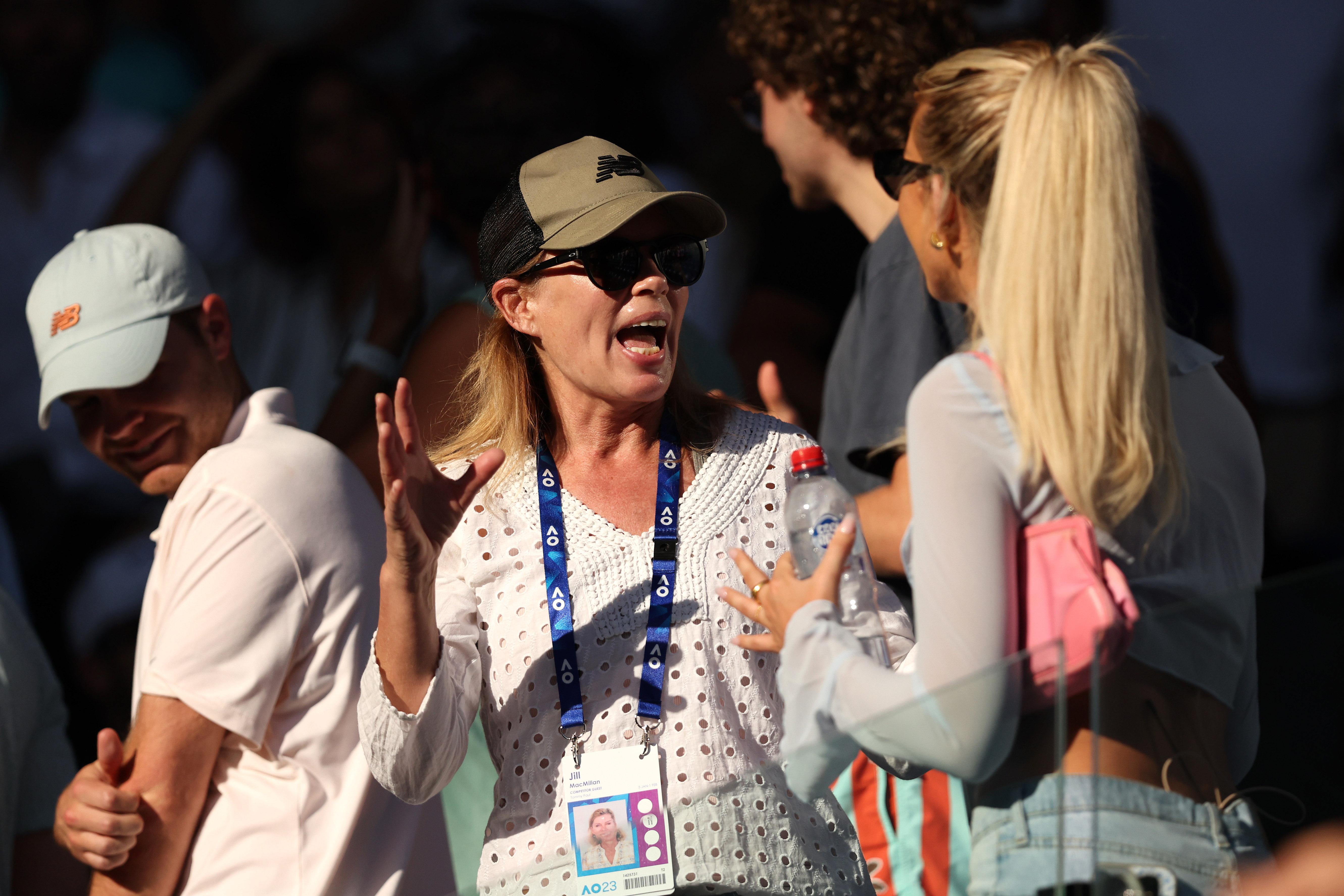 Jill MacMillan engages in a conversation with Tommy Paul's girlfriend Paige Lorenze a the 2023 Australian Open on January 25, 2023, in Melbourne, Australia. | Source: Getty Images