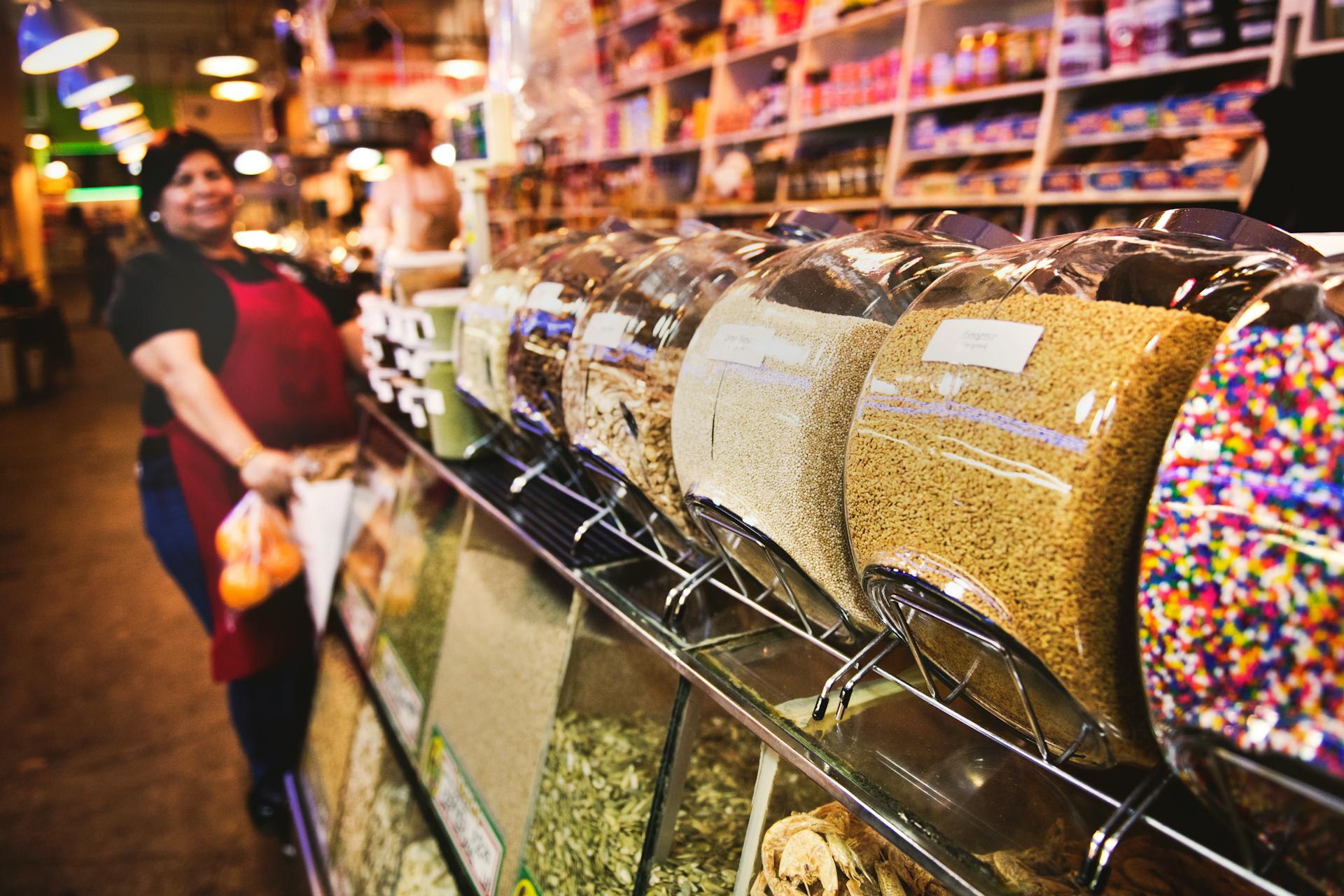 A woman working in a grocery store | Source: Pexels