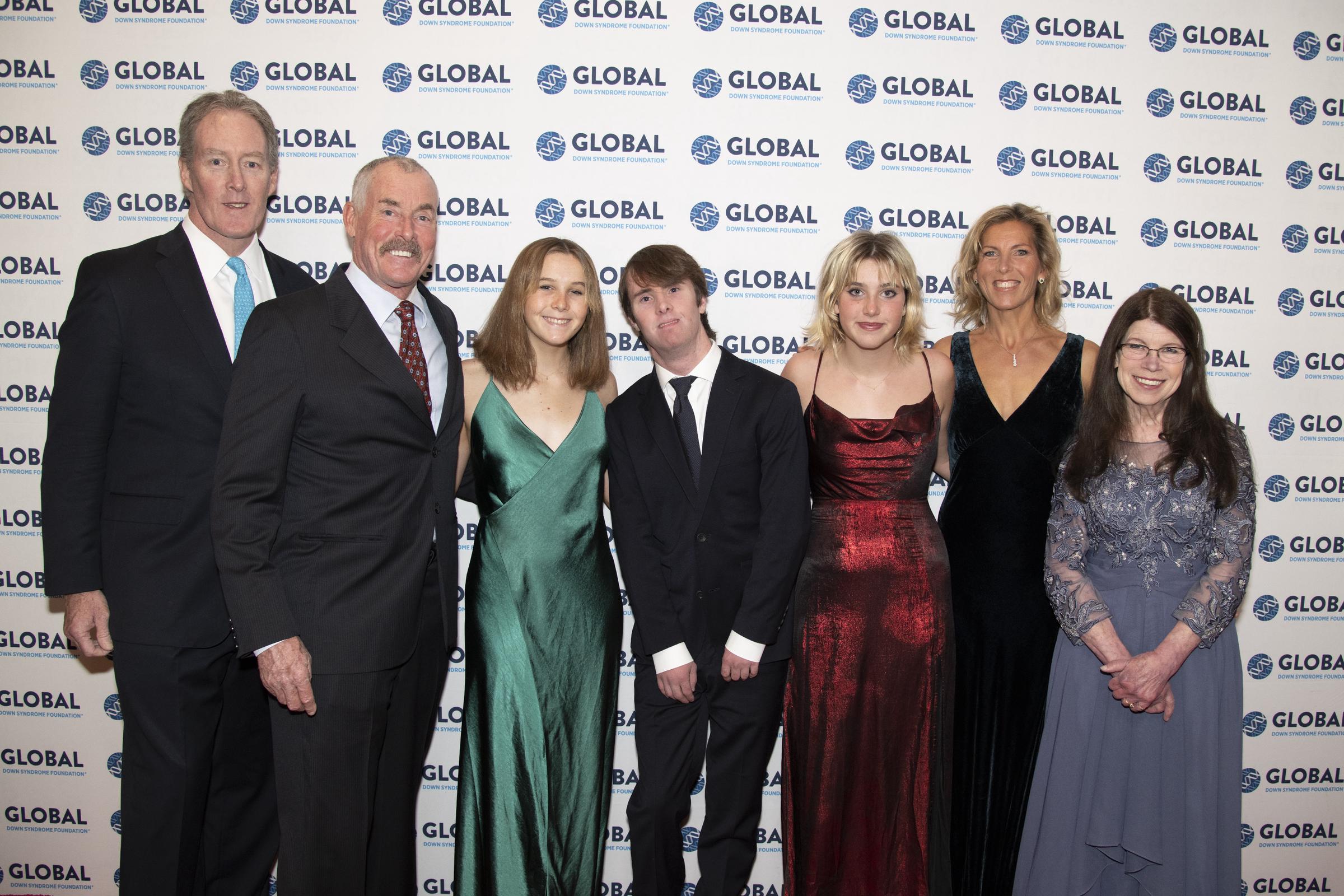 The Hollywood star with his son Max McGinley and their family at the Global Down Syndrome Foundation's 14th Annual Be Beautiful Be Yourself fashion show on November 12, 2022, in Denver, Colorado. | Source: Getty Images