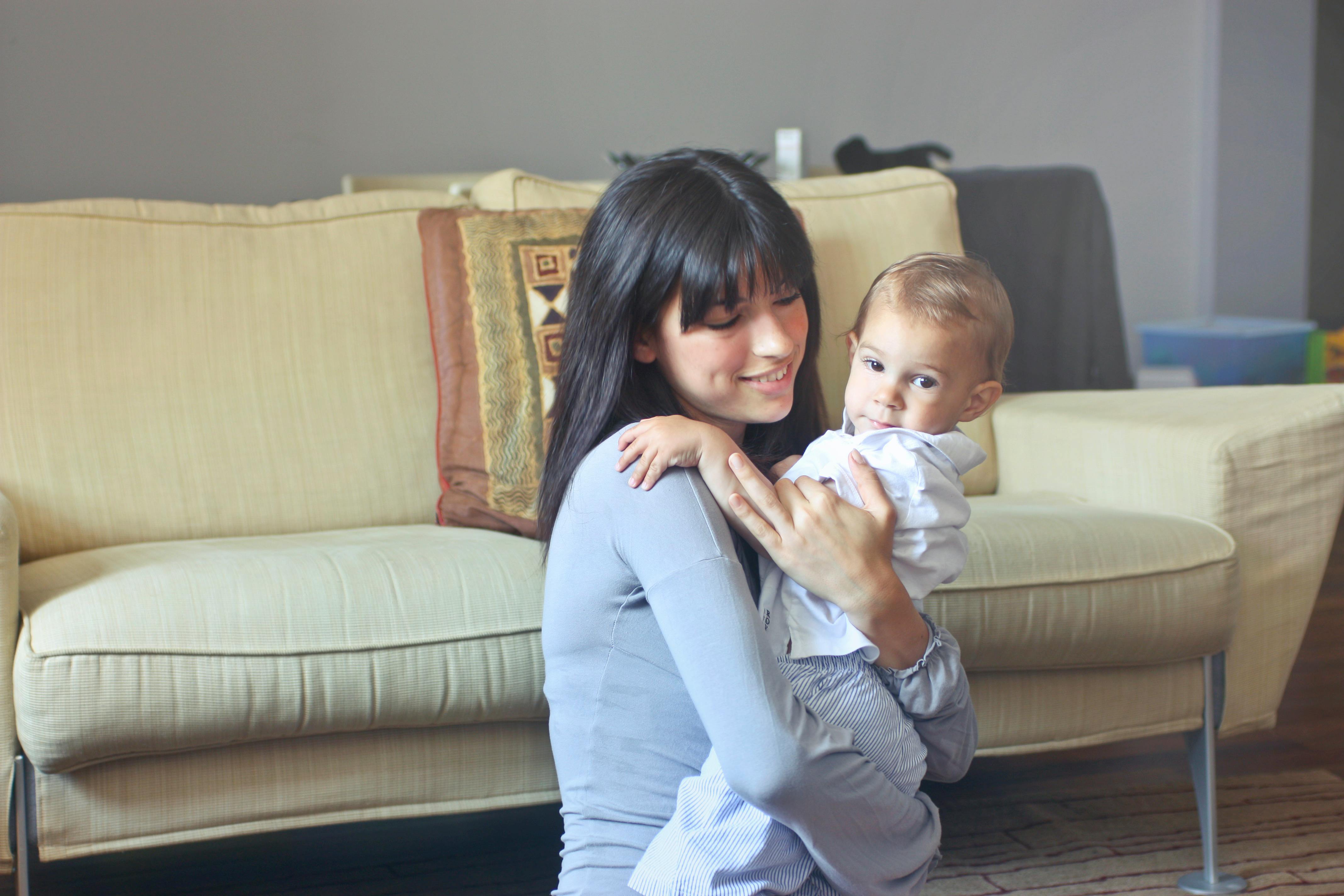 Dark-haired woman with a kid | Source: Pexels