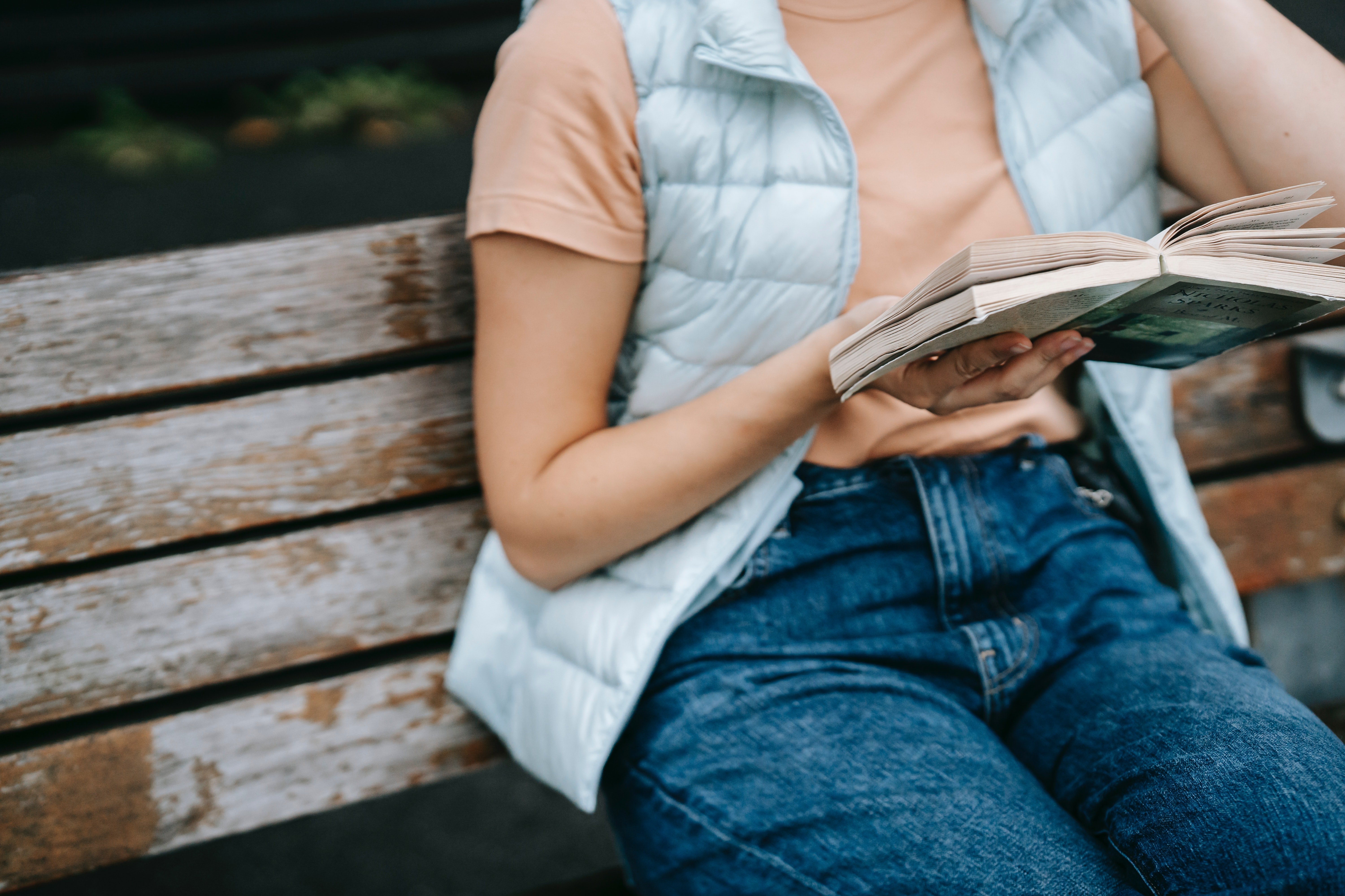 Olivia was busy reading a book that she did not notice Jacob sitting in the same spot for hours. | Source: Pexels