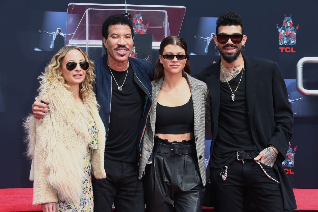 Nicole Richie, Lionel Richie, Sofia Richie and Miles Richie at the Lionel Richie Hand And Footprint Ceremony at TCL Chinese Theatre on March 7, 2018. | Source: Getty Images