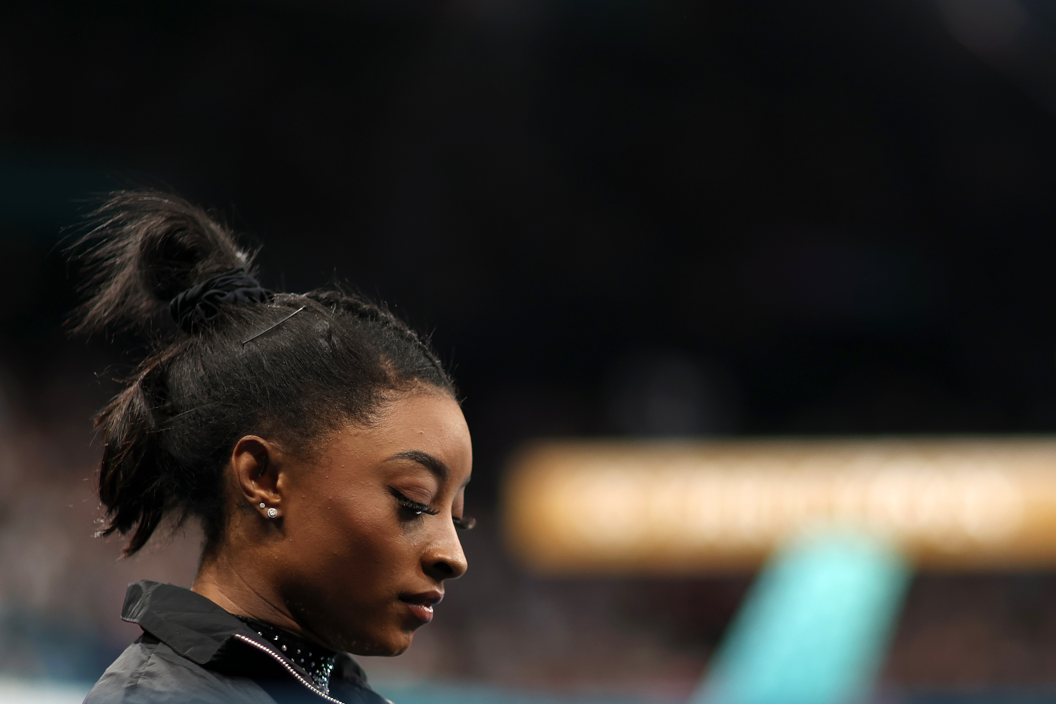 Simone Biles before her balance beam routine during the Women's Artistic Gymnastics Qualification at the Paris 2024 Olympics in Paris, France on July 28, 2024 | Source: Getty Images