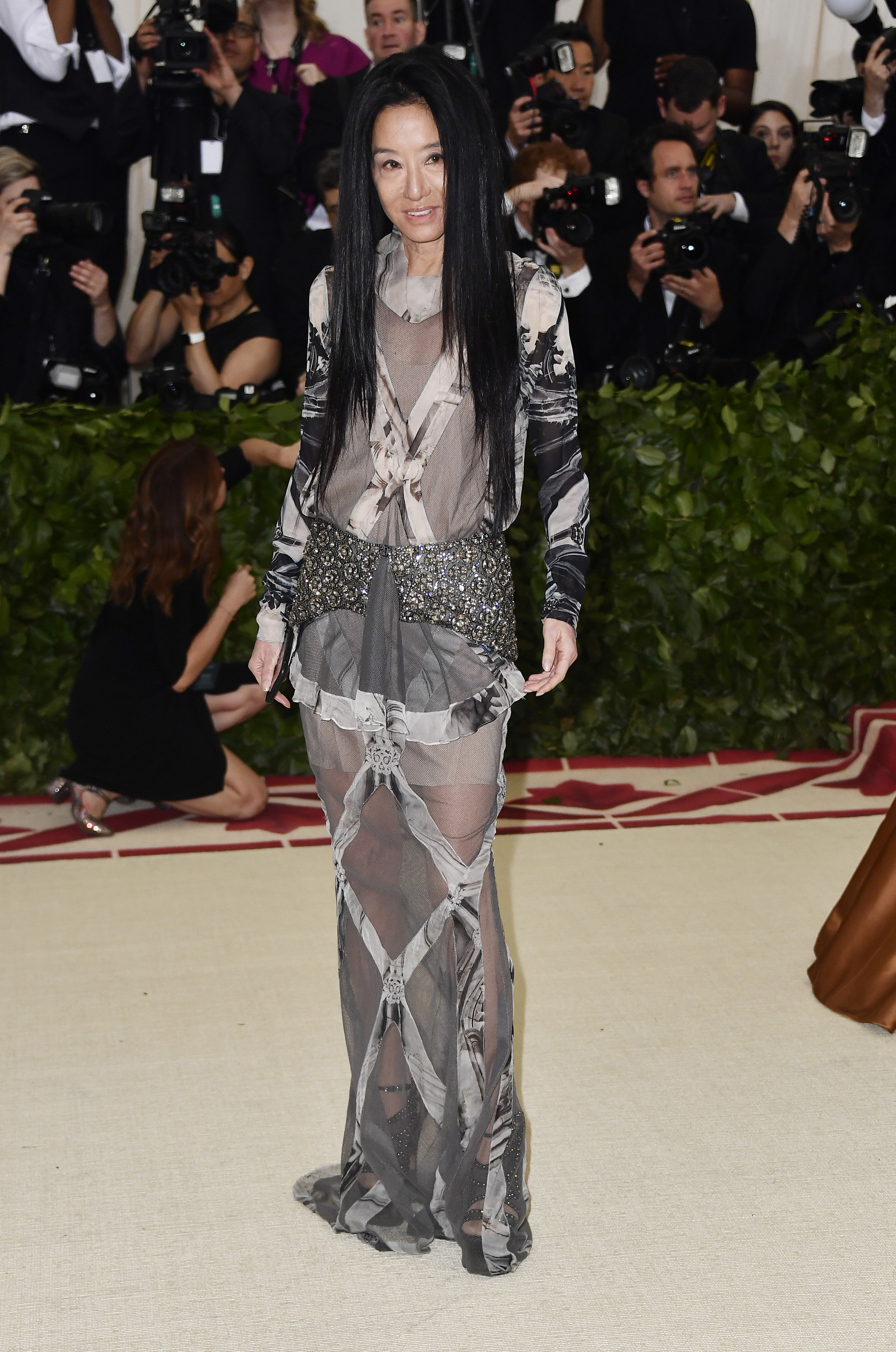 Vera Wang's personal fashion choices consistently made her the talk of the town. For this appearance, she attended the Heavenly Bodies: Fashion & The Catholic Imagination Costume Institute Gala at The Metropolitan Museum of Art on May 7, 2018, in New York City, New York. | Source: Getty Images