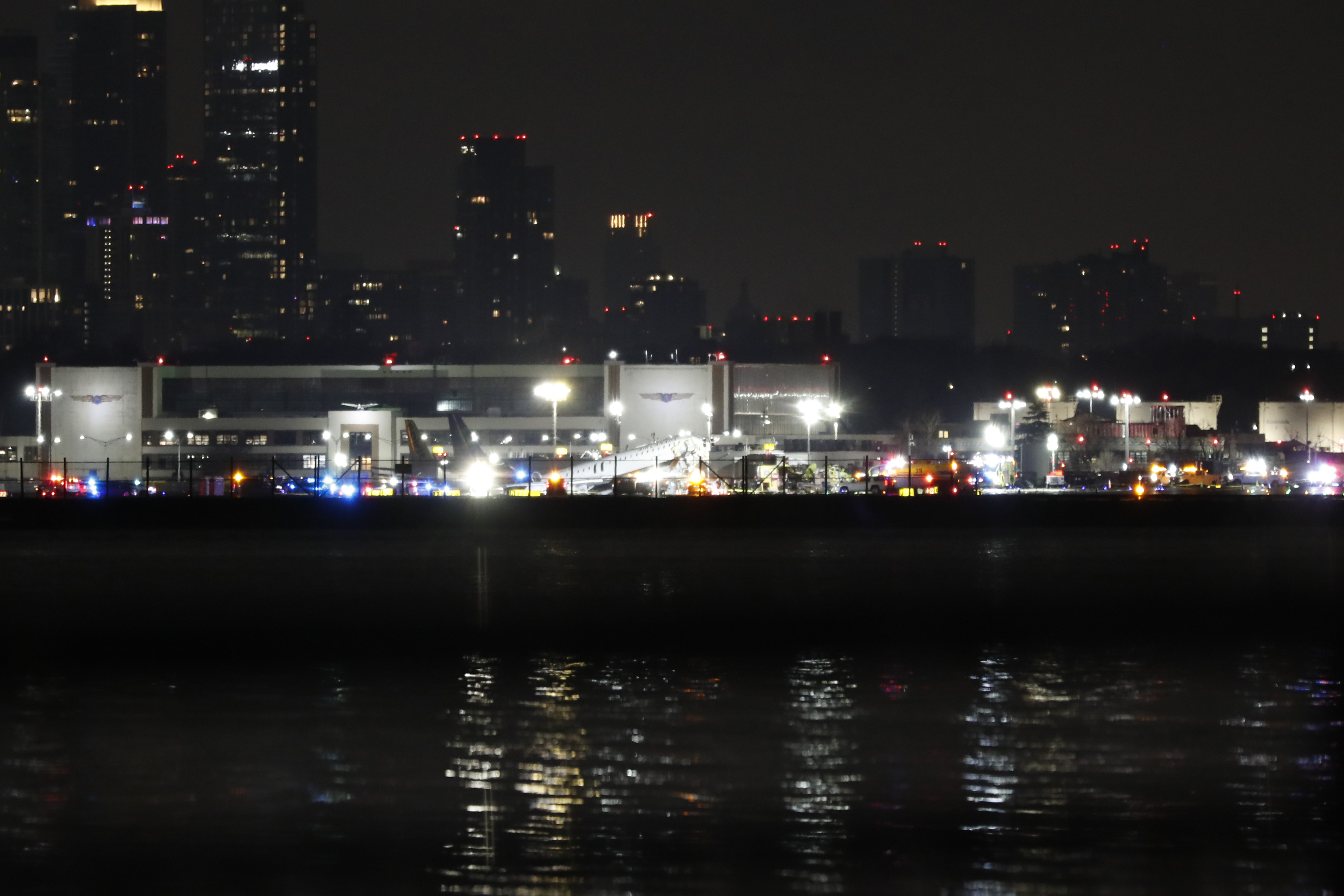 The crash site after the Air Canada plane incident at LaGuardia Airport in New York City on March 23, 2026. | Source: Getty Images
