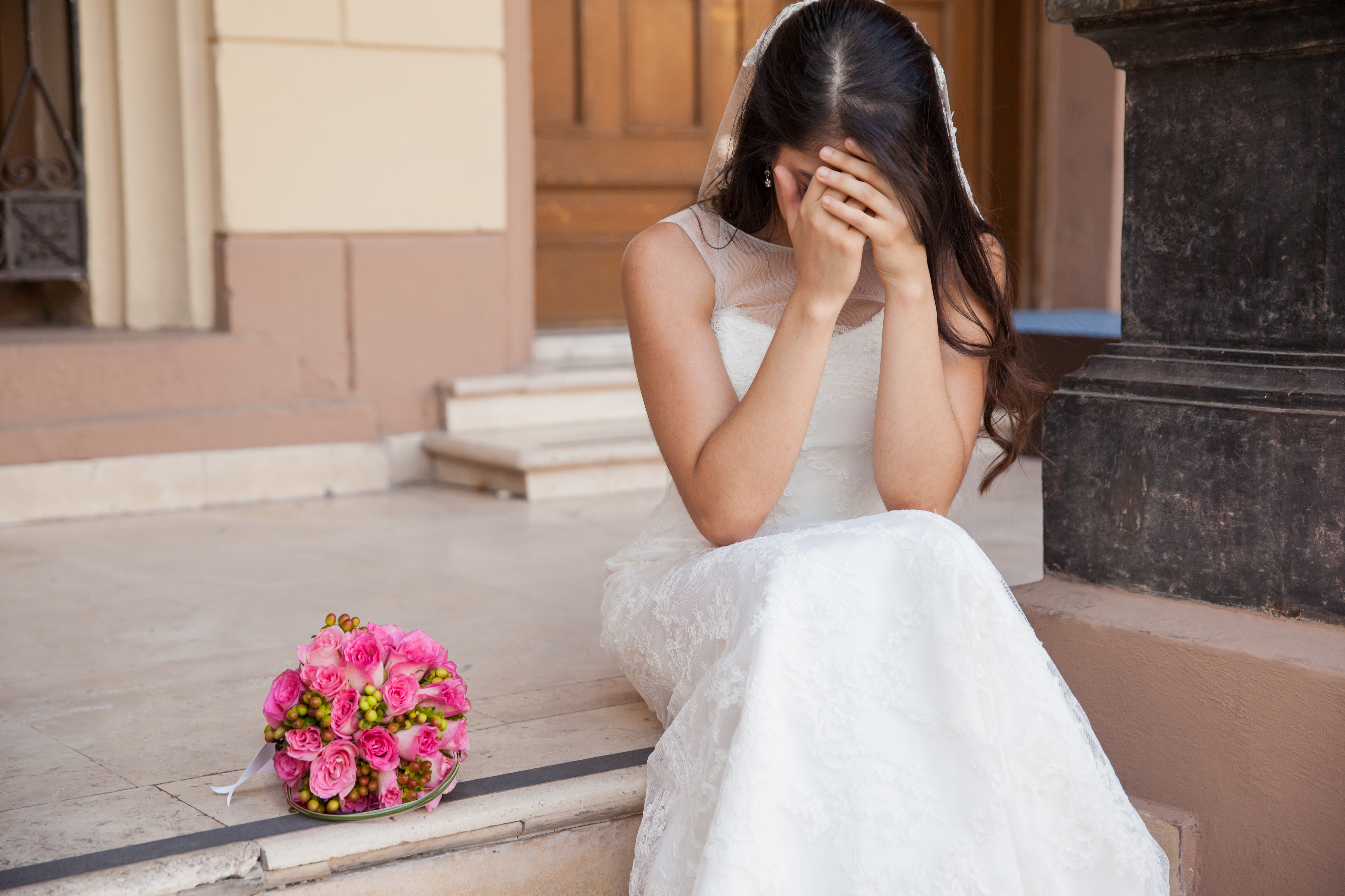 A hopeless bride crying on her wedding day | Source: Shutterstock