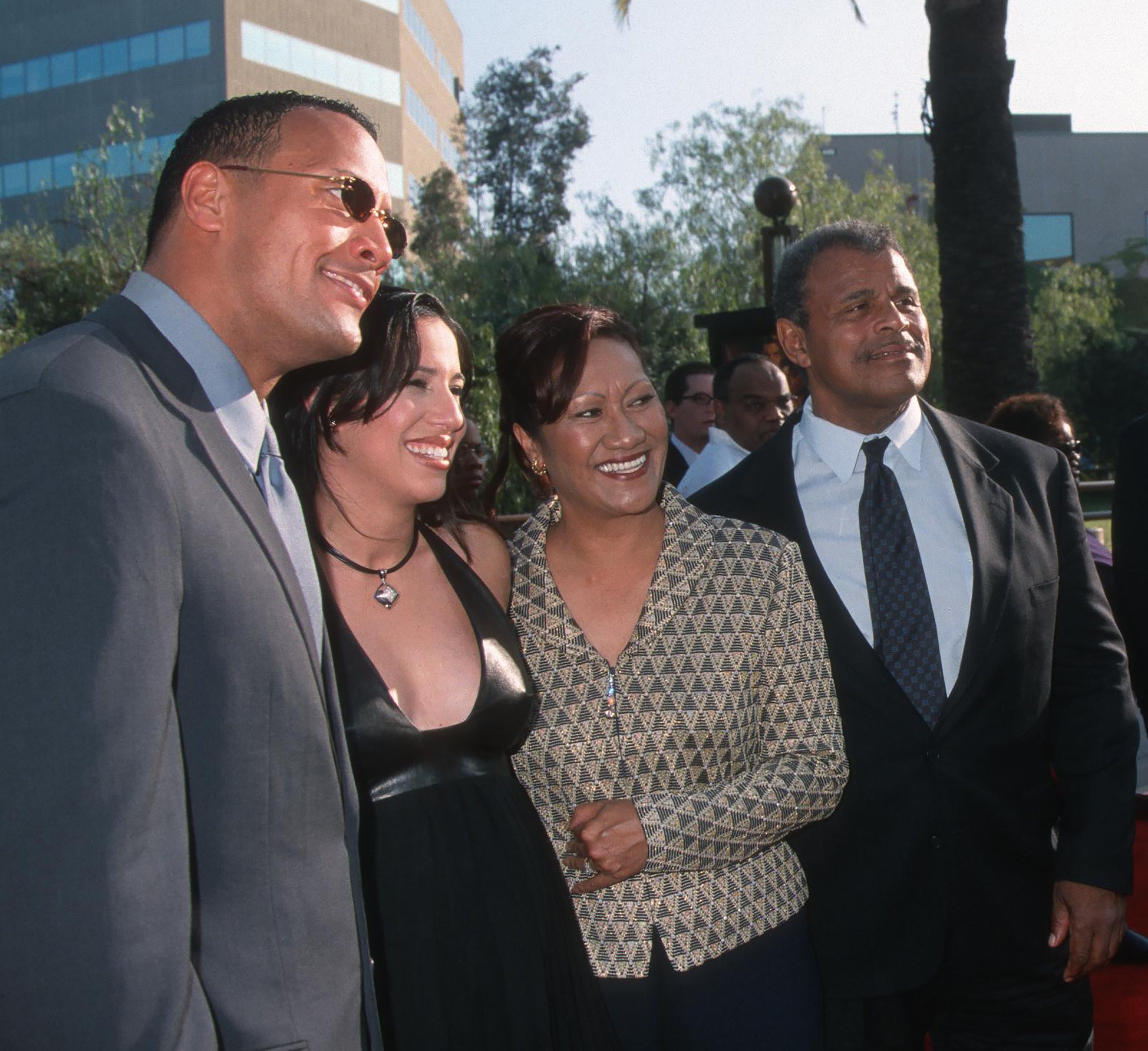 Dwayne Johnson, Dany Johnson (nee Garcia), Ata Johnson (nee Maivia), and Rocky Johnson at the premiere of "The Mummy Returns" in Universal City, California, on April 29, 2001 | Source: Getty Images