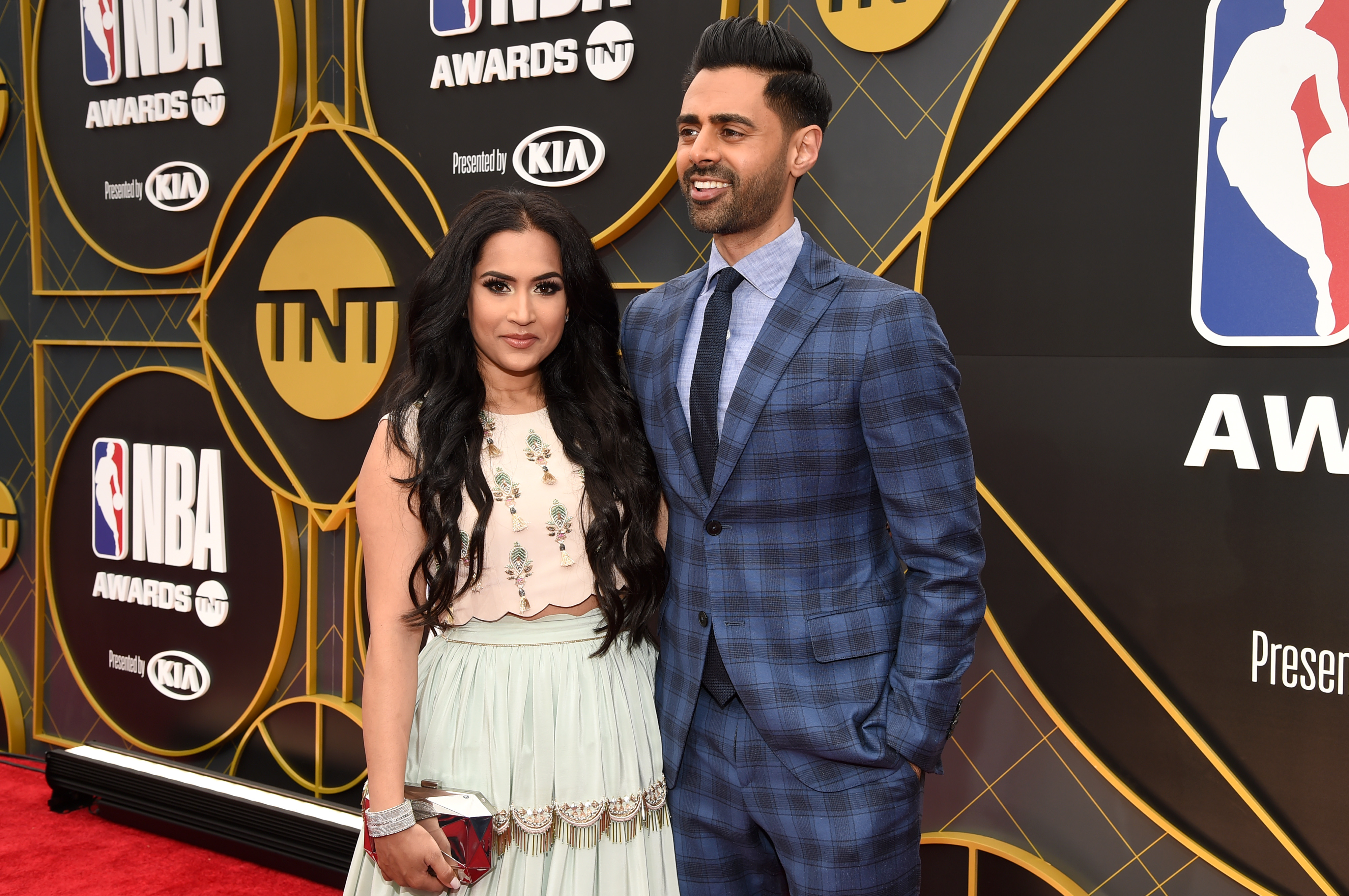 Beena Patel and Hasan Minhaj are pictured at the 2019 NBA Awards presented by Kia on TNT at Barker Hangar on June 24, 2019, in Santa Monica, California | Source: Getty images