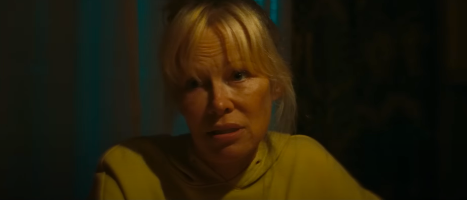 Pamela Anderson as Shelley. | Source: YouTube/RoadsideFlix