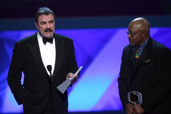 Tom Selleck and Roger E. Mosley accept the Hero Award for "Magnum P.I." onstage at the 7th Annual TV Land Awards held at Gibson Amphitheatre on April 19, 2009, in Universal City, California. | Source: Getty Images.