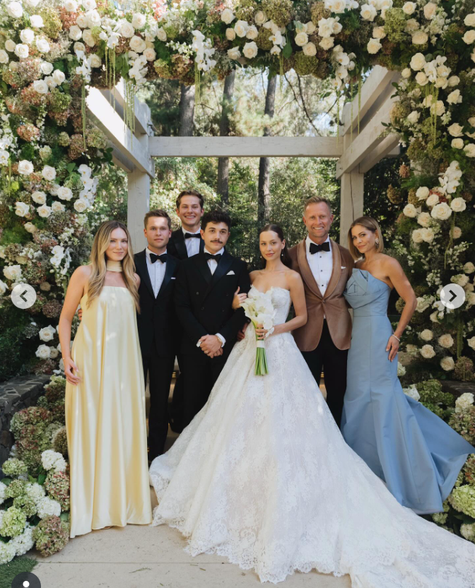Bradley Steven Perry and Natasha Bure pose with their loved ones, dated September 17, 2025 | Source: Instagram/candacecbure