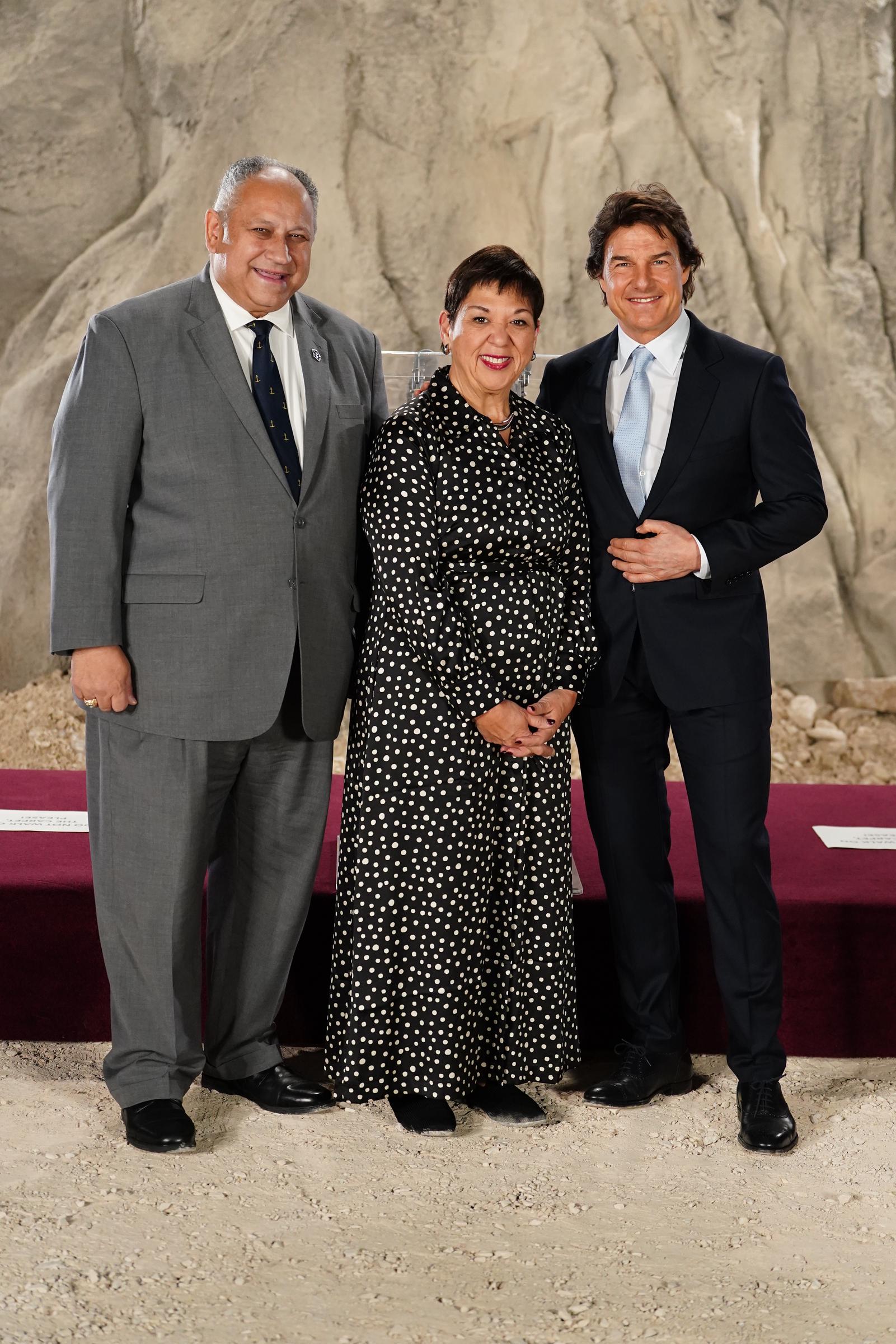 US Secretary of the Navy, Carlos Del Toro, Betty Del Toro, and Tom Cruise at Long Cross, UK, on December 17, 2024 | Source: Getty Images