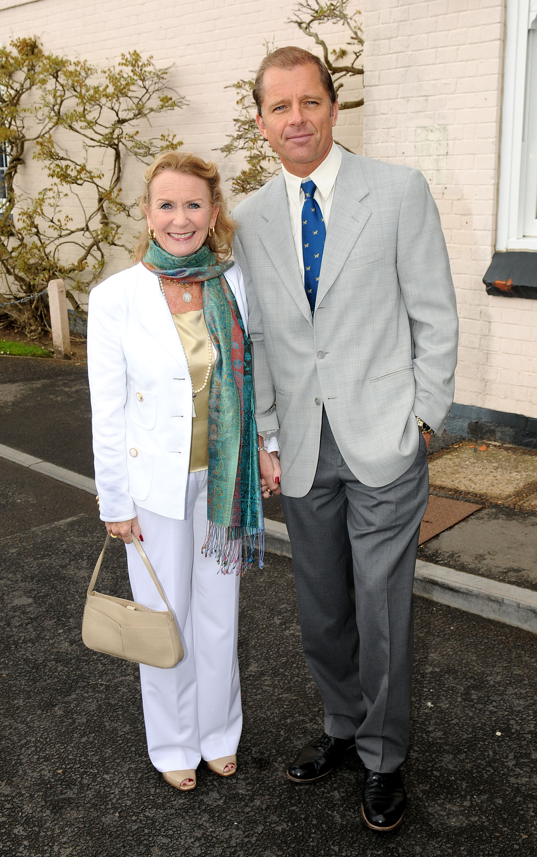 The actress and Maxwell Caulfield attend a plaque unveiling on May 9, 2010, in London, England. | Source: Getty Images
