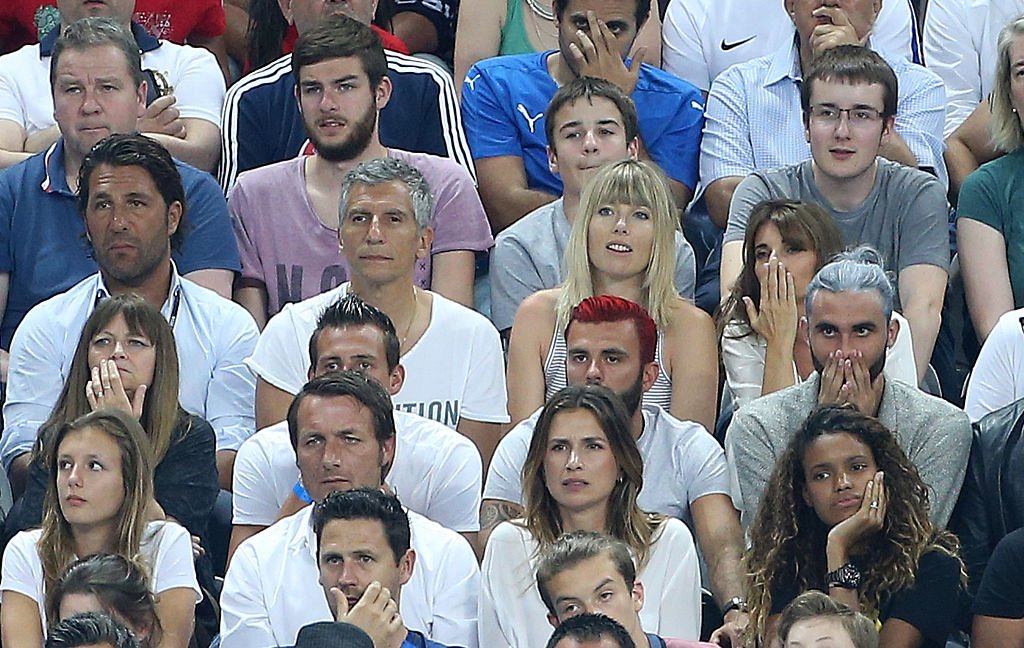 Nagui et son épouse Melanie Page assistent à la finale de l'UEFA Euro 2016 entre le Portugal et la France au Stade de France le 10 juillet 2016 à Saint-Denis près de Paris, France | Source : Getty Images.
