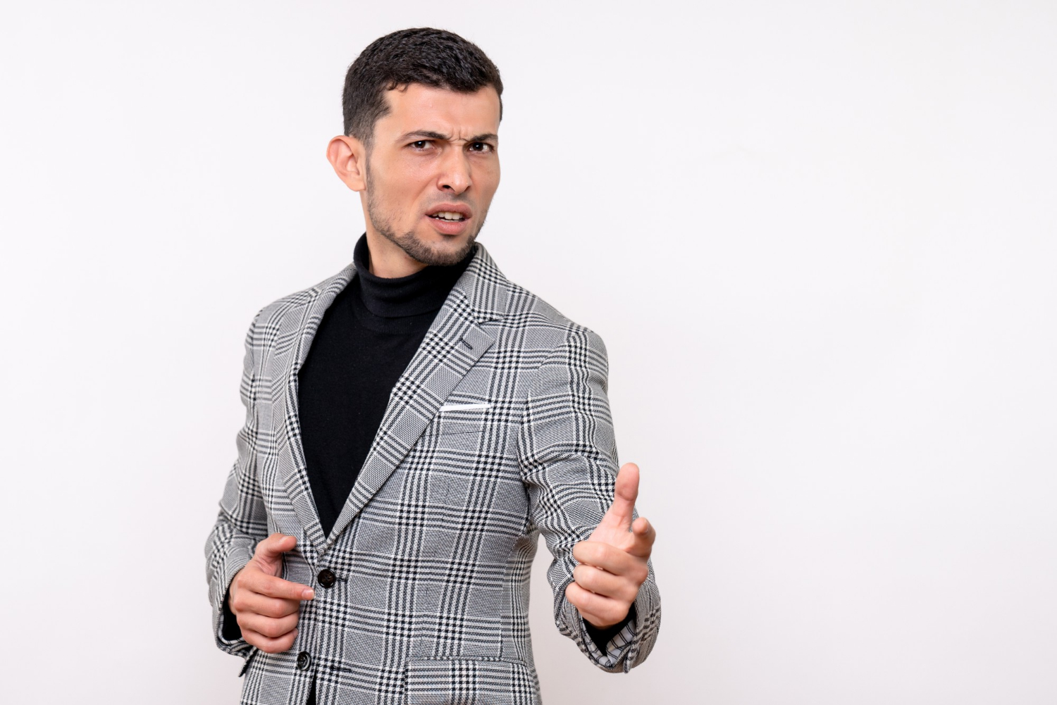 An angry man in an elegant suit | Source: Freepik
