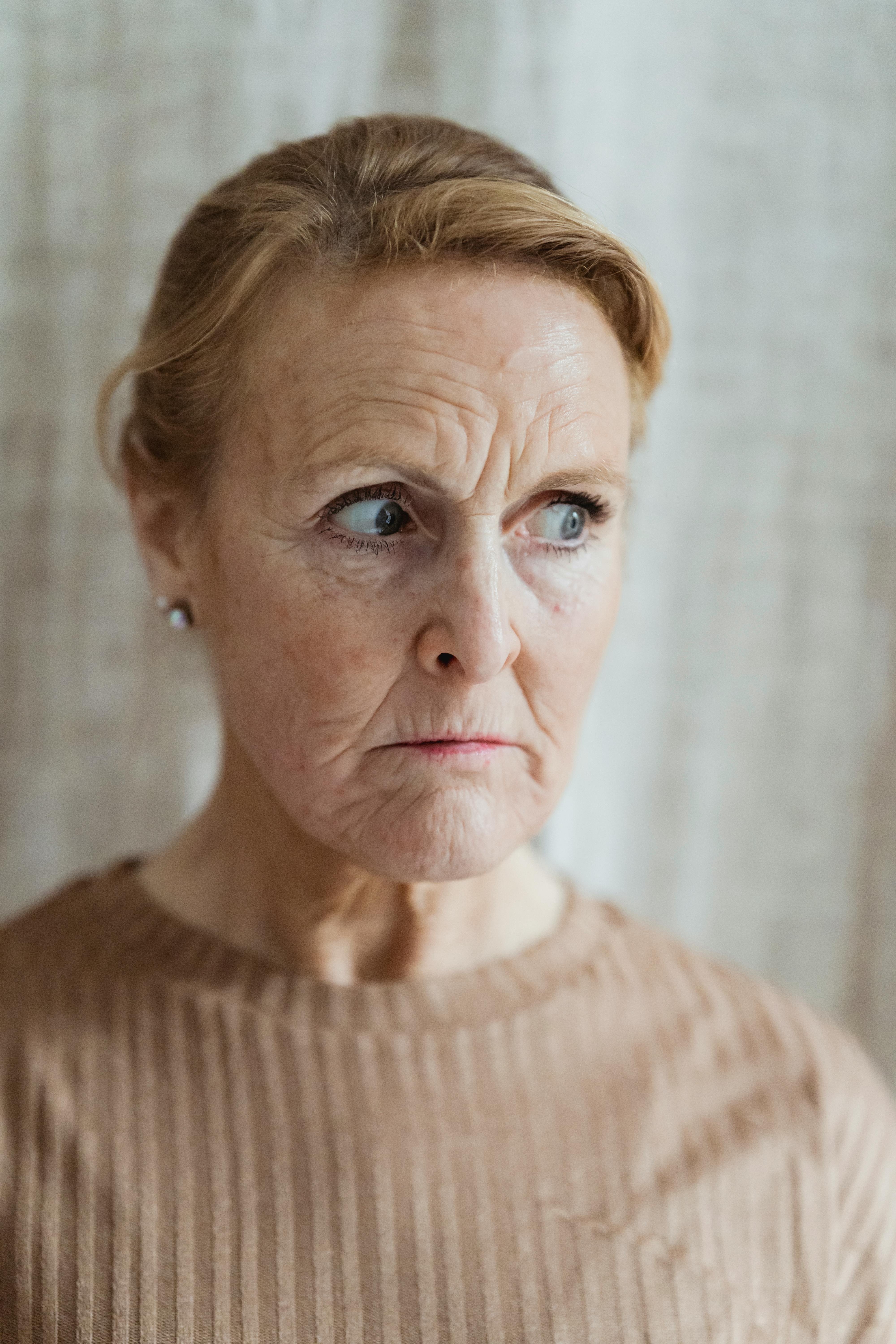 A woman with a tense look on her face | Source: Pexels