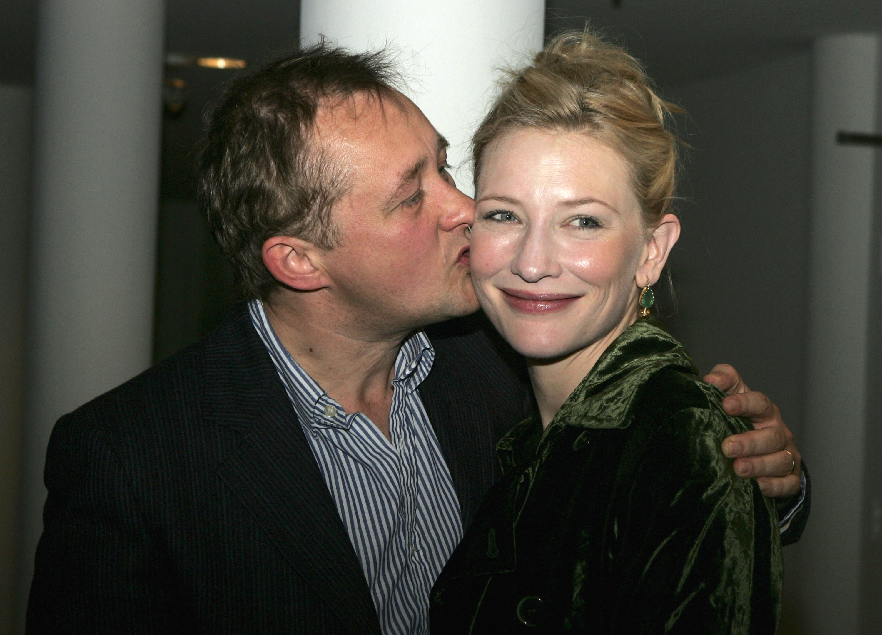 Andrew Upton kissing Cate Blanchett during the opening night party for "Hedda Gabler" on July 27, 2004, in Sydney, Australia | Source: Getty Images