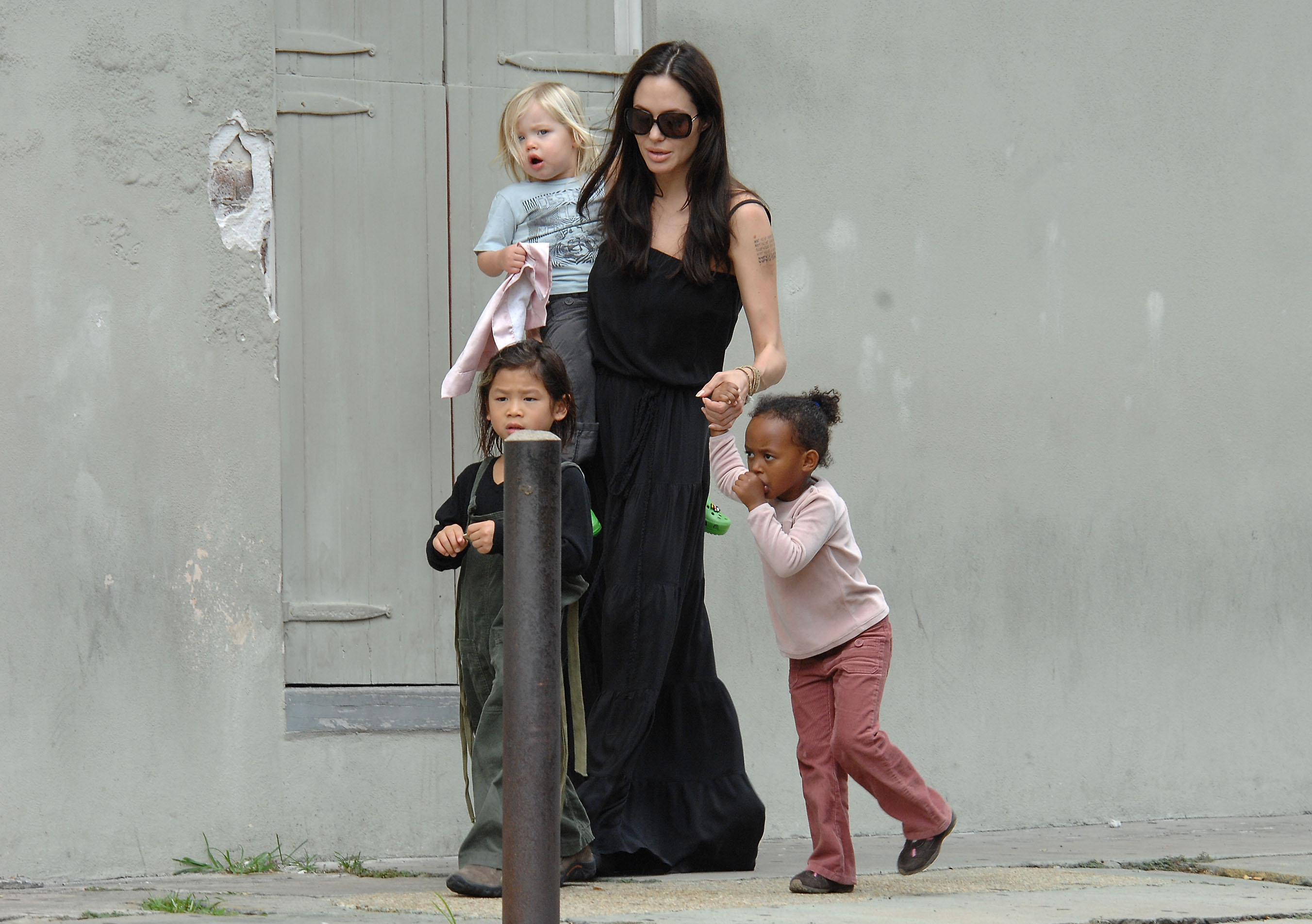 Angelina Jolie with Zahara, Pax, and Shiloh Jolie-Pitt on October 6, 2008, in New Orleans, Louisiana. | Source: Getty Images