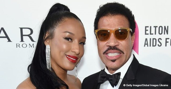 Lionel Richie looks smitten next to his lovely bae of 5 years. He admitted he'll never marry again