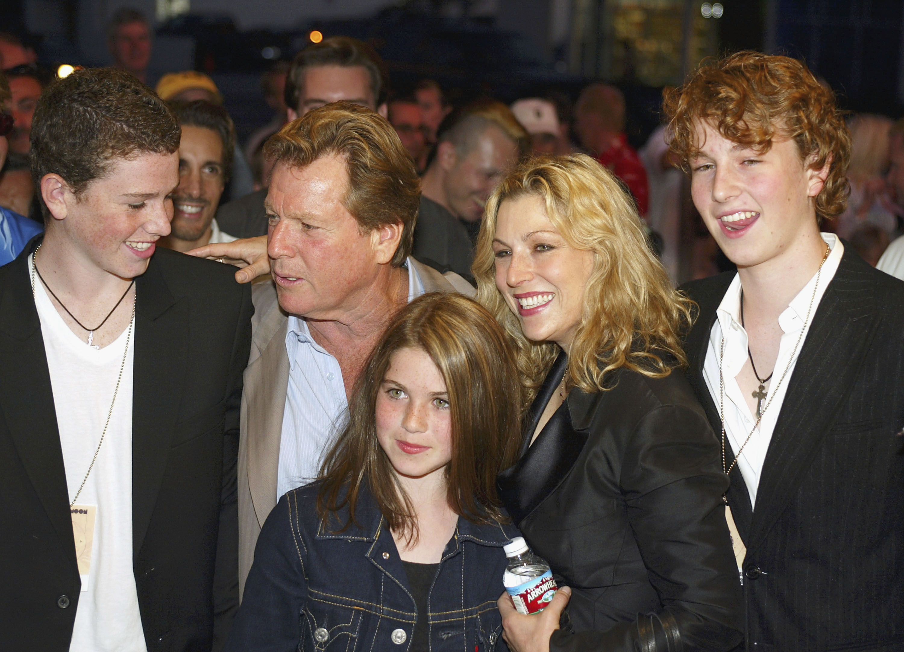  Ryan O'Neal, his daughter, Tatum O'Neal and her children Sean, Emily and Kevin McEnroe  in Los Angeles in 2003 | Source: Getty Images