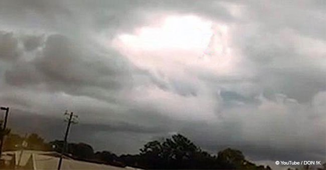 People claim they see 'God' walking through the clouds in mysterious video