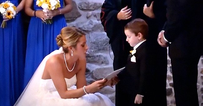 A bride includes her new step-son in her vows | Photo: Youtube/Inside Edition