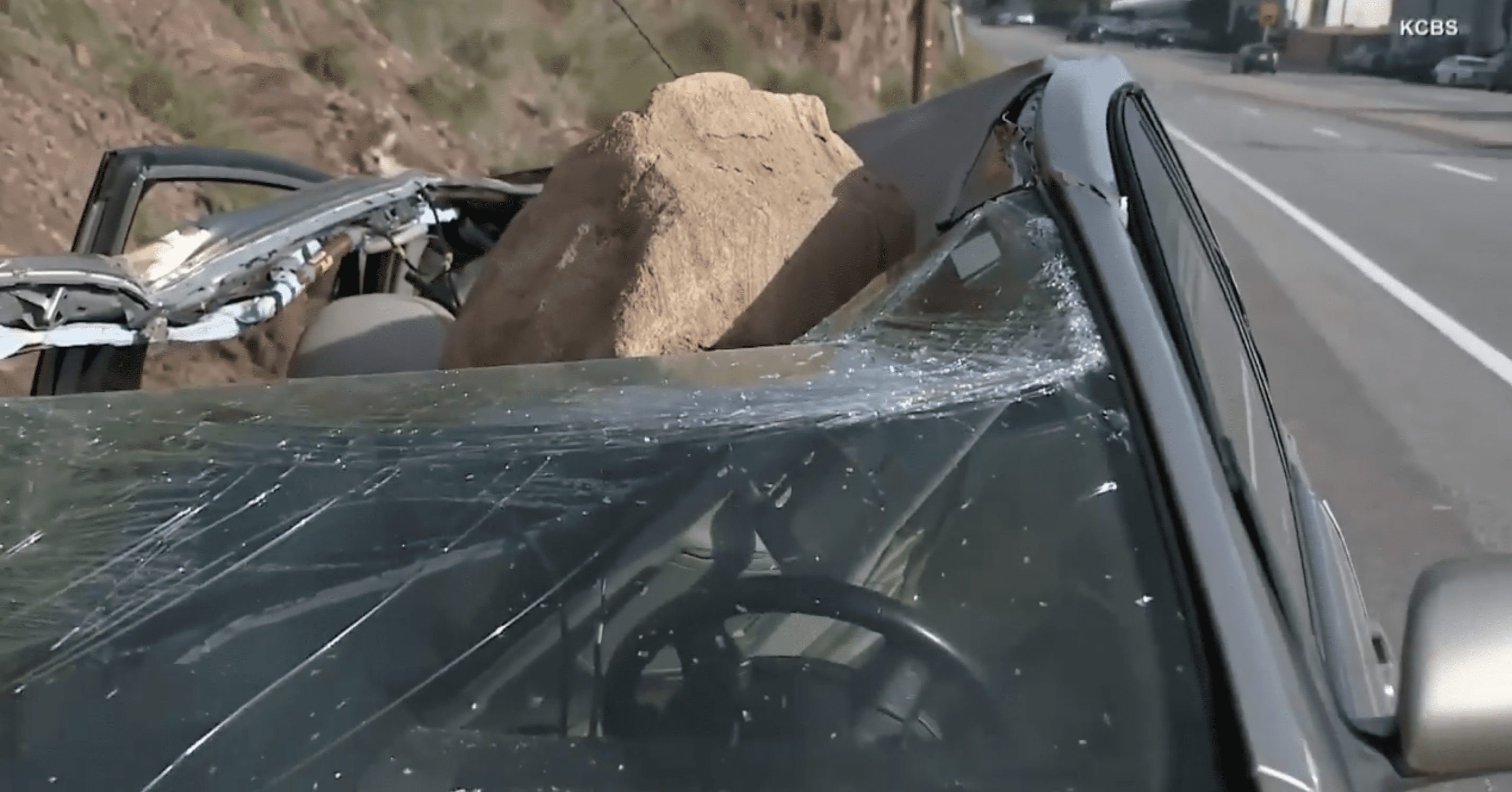 A huge boulder smashed Mauricio Henao's car parked on the Pacific Coast Highway in Malibu, California. | Source: facebook.com/Inside.Edition