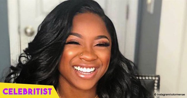 Reginae Carter & her older boo enjoy date night as they go twinning in Gucci tank tops