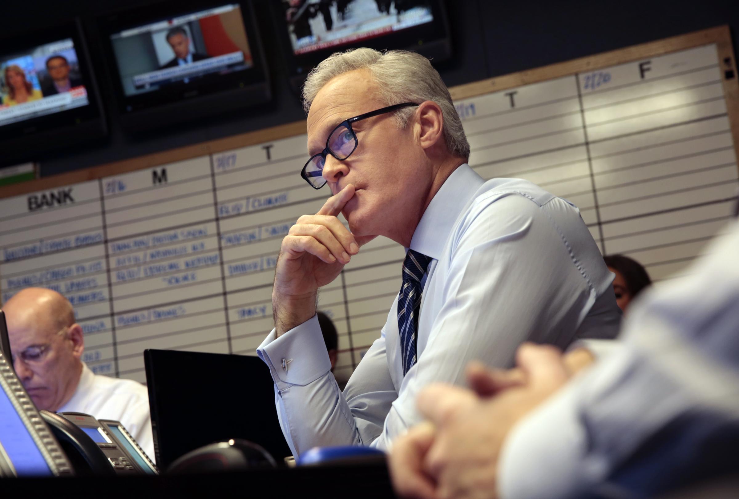 Scott Pelley works in the CBS News newsroom in New York City on February 23, 2015, while serving as anchor and managing editor of the "CBS Evening News." | Source: Getty Images