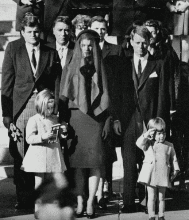 John F. Kennedy Jr. salutes his father's casket during his funeral on November 25, 1963. | Source: YouTube/CNN