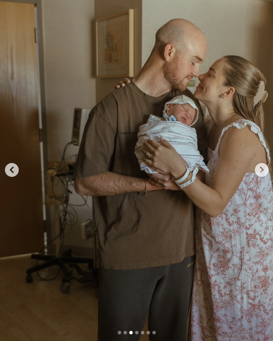 Brady and Emilie Kiser hold their newborn baby, Theodore, in a photo dated March 29, 2025 | Source: Instagram/emiliekiser