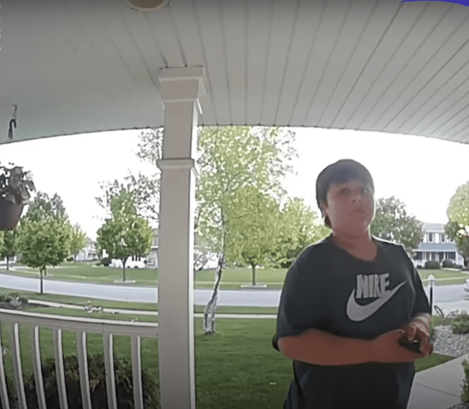 Vince waiting outside the Dahlke residence to return the wallet. | Source: YouTube.com/GMA