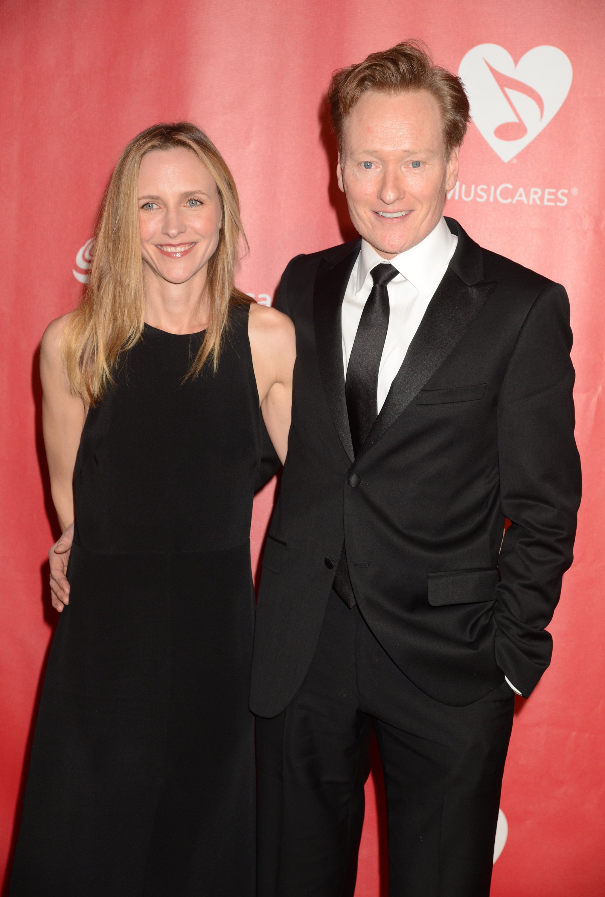 Liza Powel O'Brien and Conan O'Brien attend the 2013 MusiCares Person Of The Year Honoring Bruce Springsteen at Los Angeles Convention Center on February 8, 2013, in Los Angeles, California. | Source: Getty Images