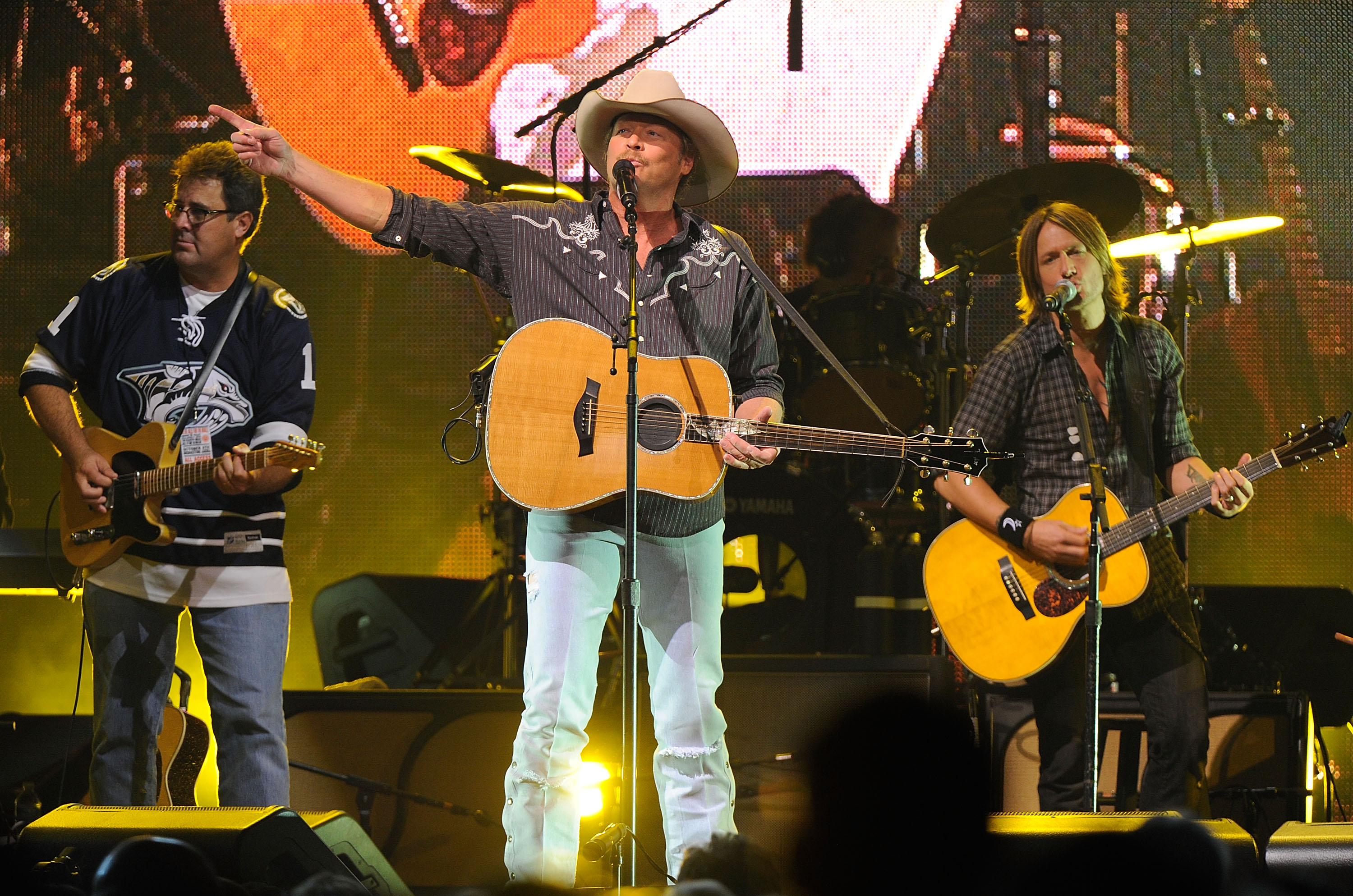 Vince Gill, Alan Jackson, and Keith Urban performing together at the We're All For The Hall benefit concert in Nashville, Tennessee on October 5, 2010. | Source: Getty Images