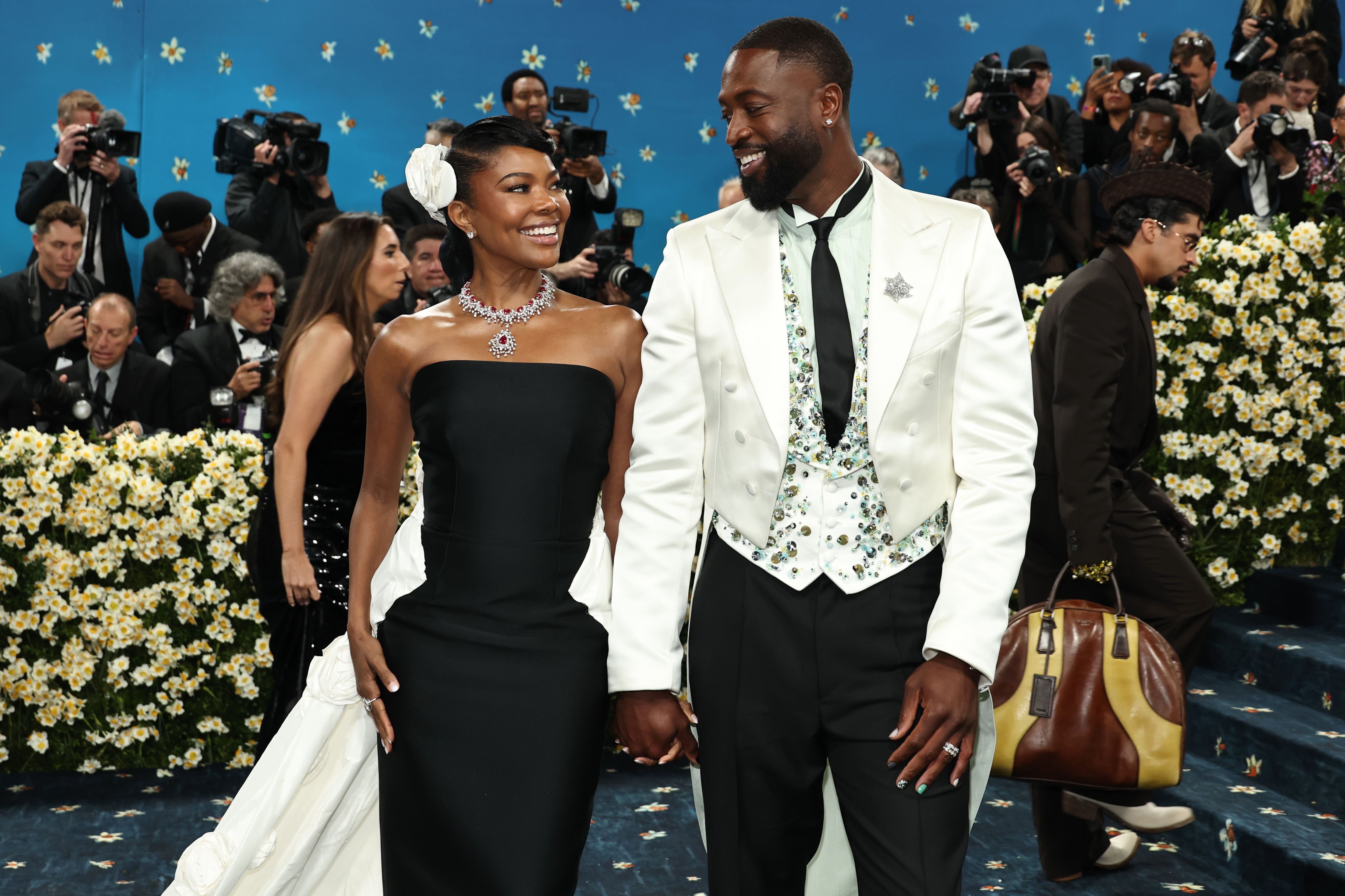 Gabrielle Union and Dwayne Wade pictured at the Met Gala Celebrating "Superfine: Tailoring Black Style" on May 5, 2025, in New York City. | Source: Getty Images