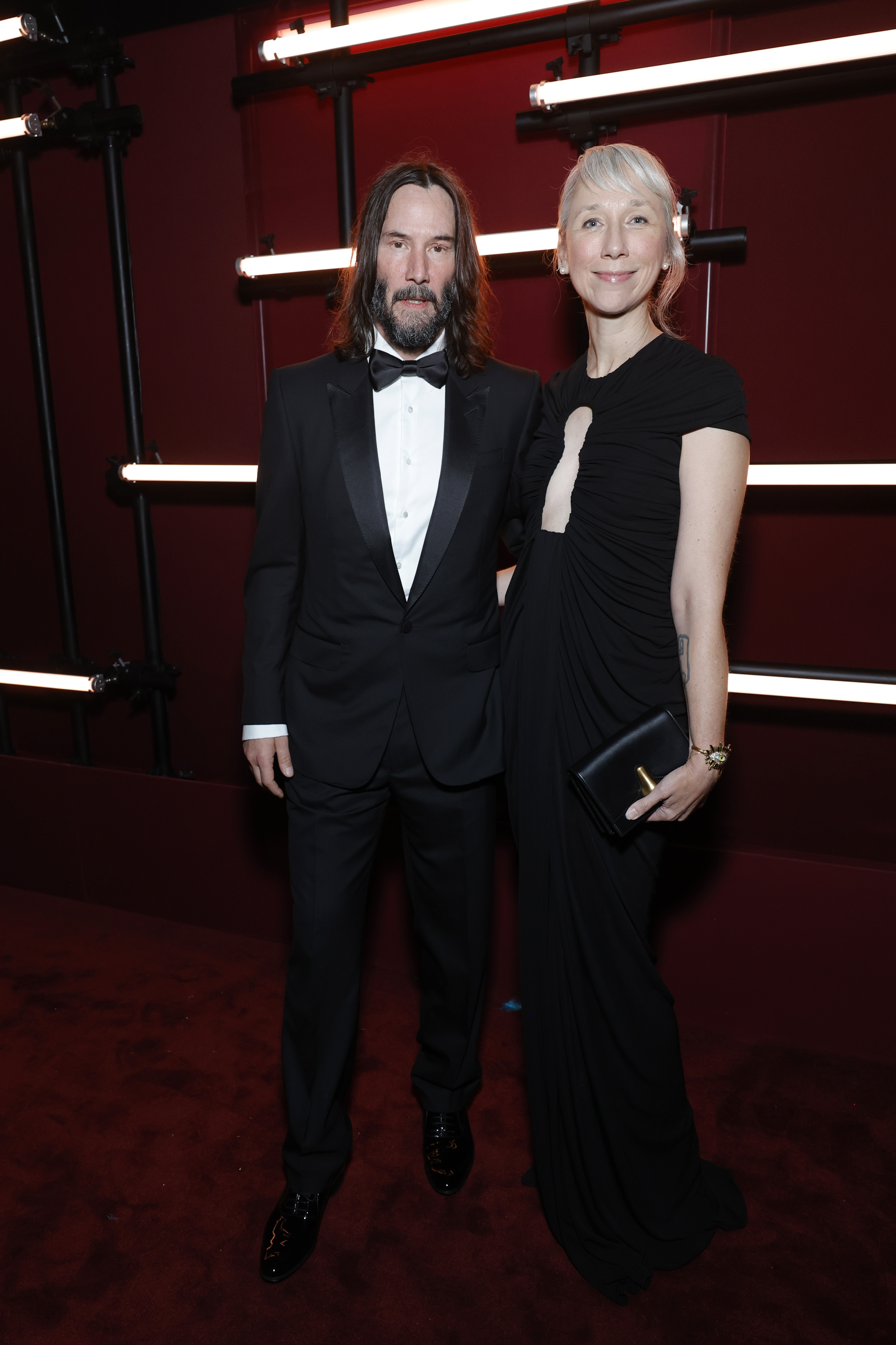 Keanu Reeves, wearing Gucci, and Alexandra Grant attend the 2023 LACMA Art+Film Gala, Presented By Gucci at Los Angeles County Museum of Art on November 04, 2023