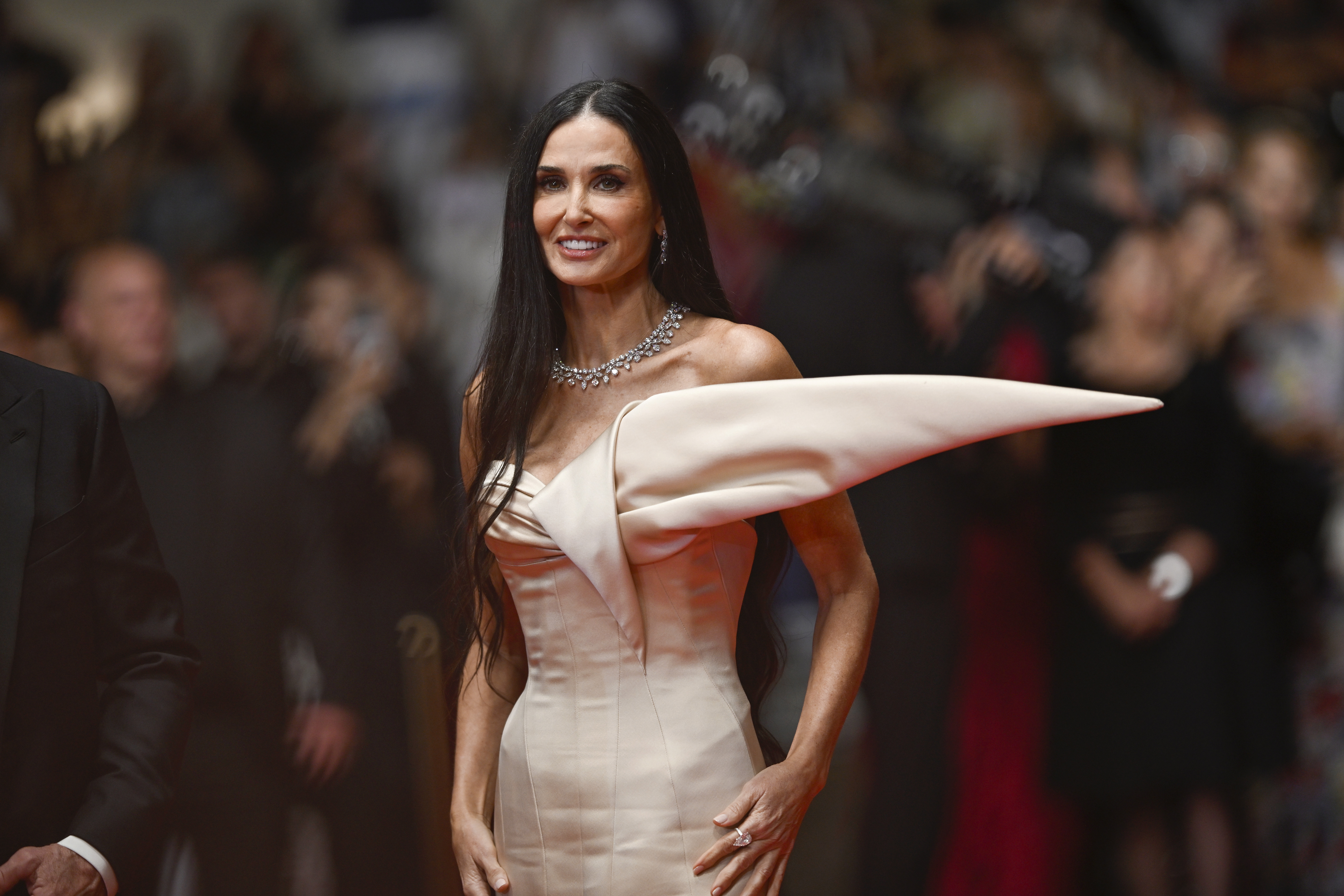 Demi Moore attends the "The Substance" Red Carpet at the 77th annual Cannes Film Festival at Palais des Festivals in Cannes, France, on May 19, 2024. | Source: Getty Images