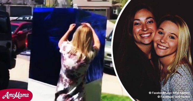 Woman's emotional response to a refrigerator-sized graduation gift