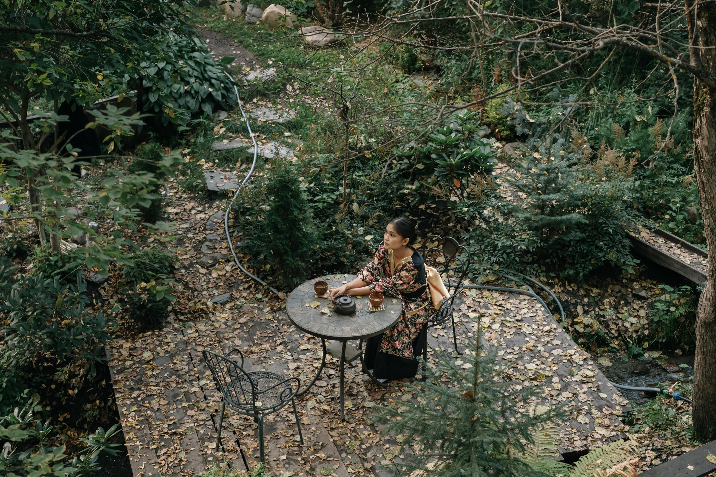 A woman lounging in her garden | Source: Pexels