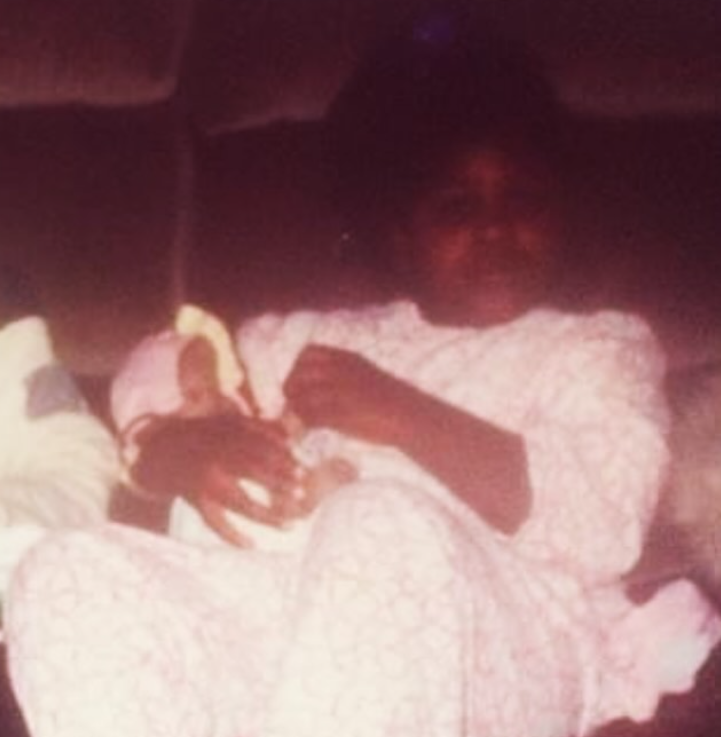 The actress as a baby, resting beside her mother in an intimate early moment | Source: Instagram/gabbysidibe