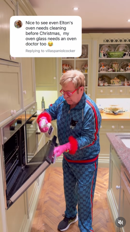 In his follow-up Reel, John swings open the infamous oven door, pink gloves on and cleaner at the ready — a glamorous clapback to the fan who joked his oven needed "a doctor" before Christmas. | Source: Instagram/eltonjohn
